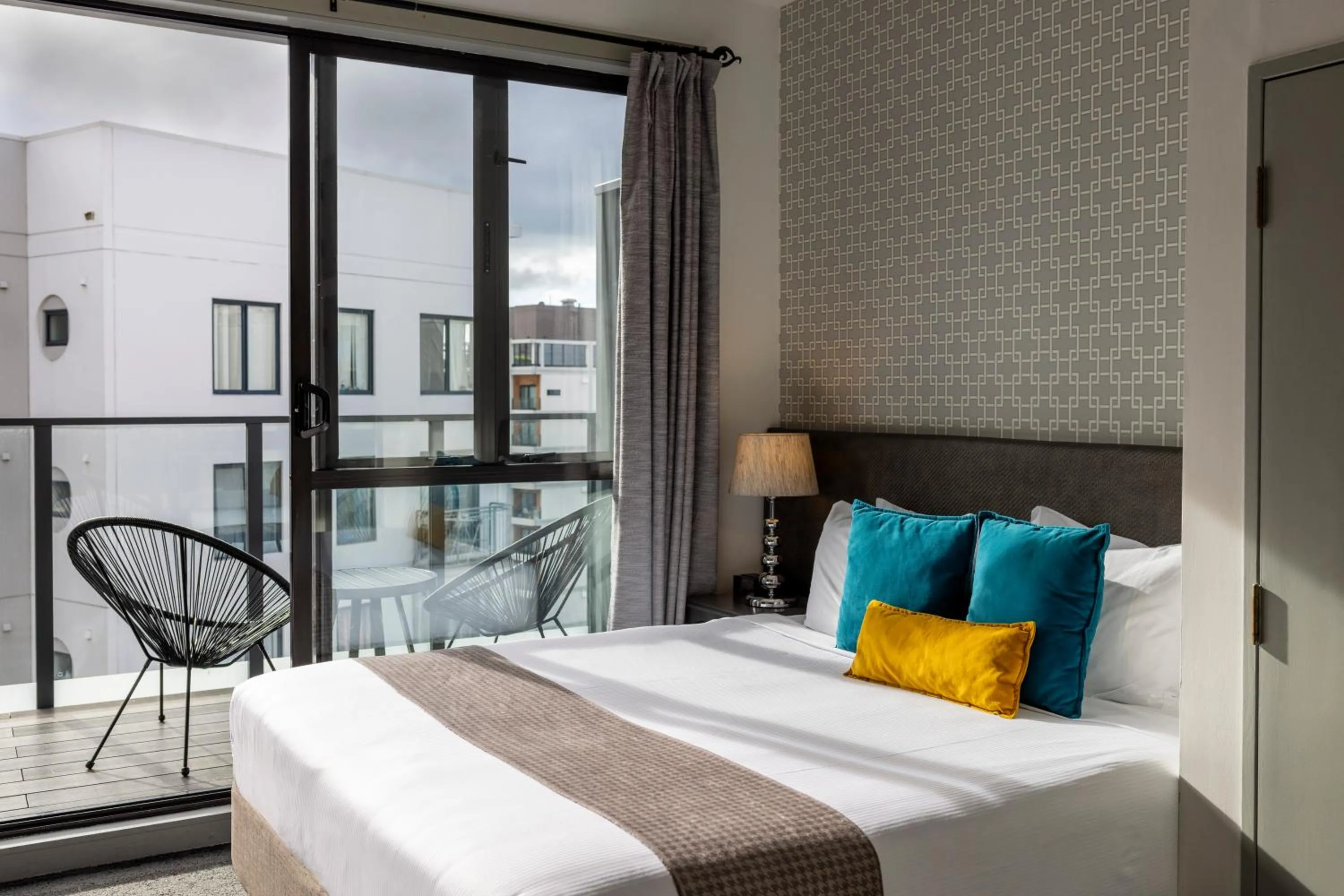 Balcony/Terrace, Bed in Quest on Eden Auckland CBD Apartment Hotel