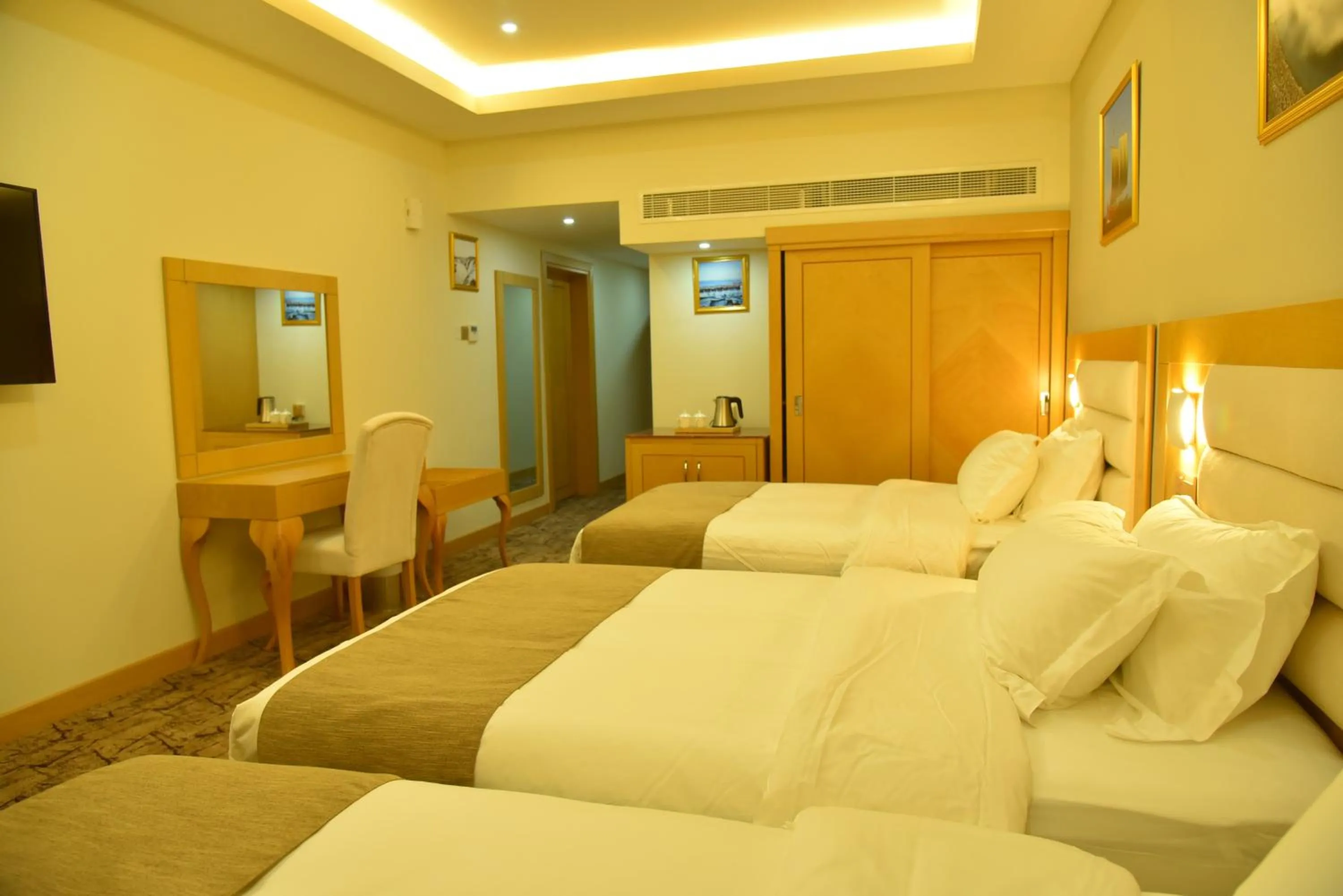 Property building, Bed in Muscat Plaza Hotel