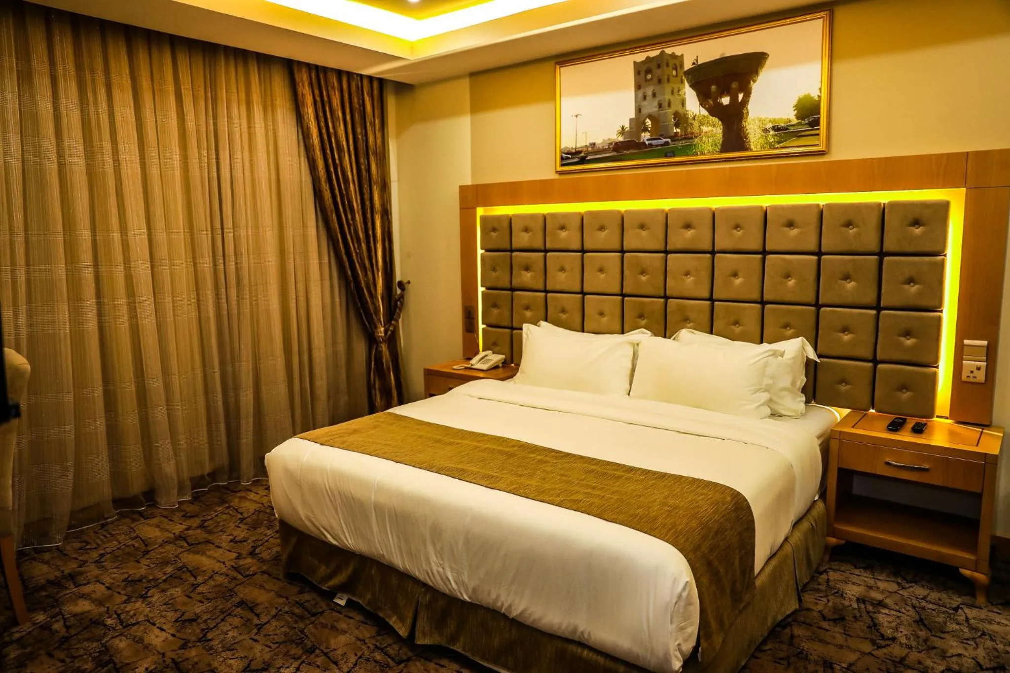 Bed in Muscat Plaza Hotel