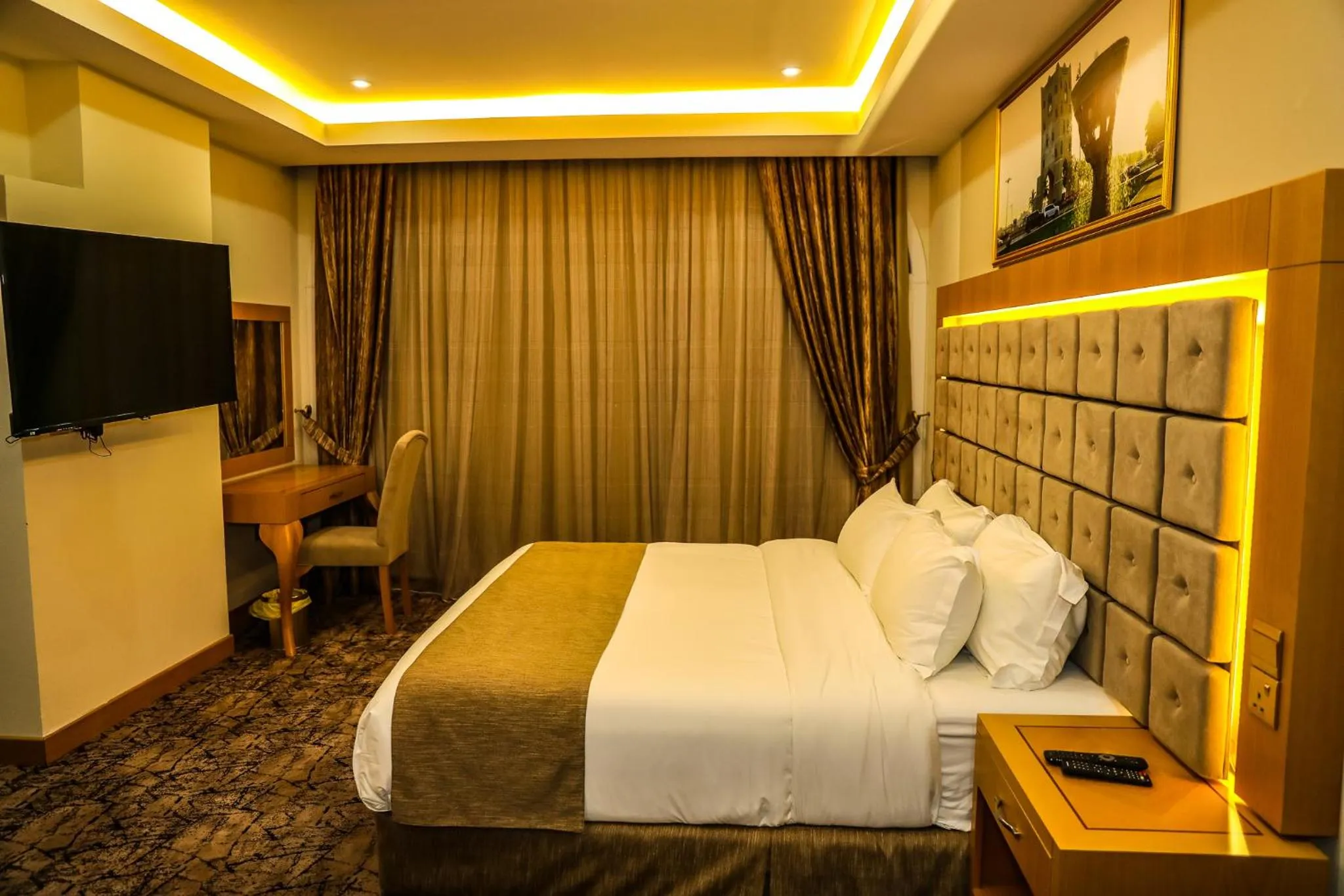 Bed in Muscat Plaza Hotel