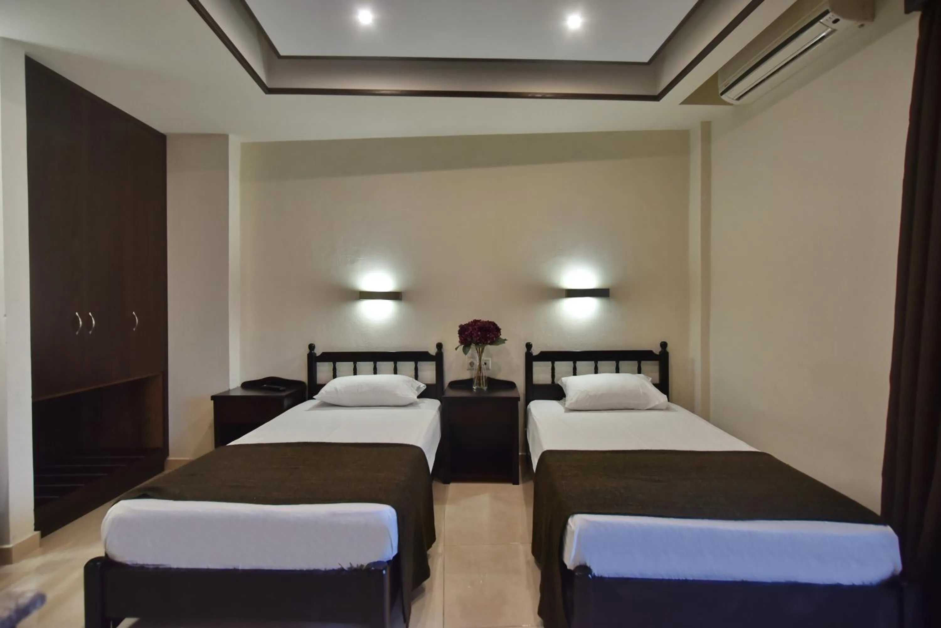 Bed in 24 Seven Boutique Hotel