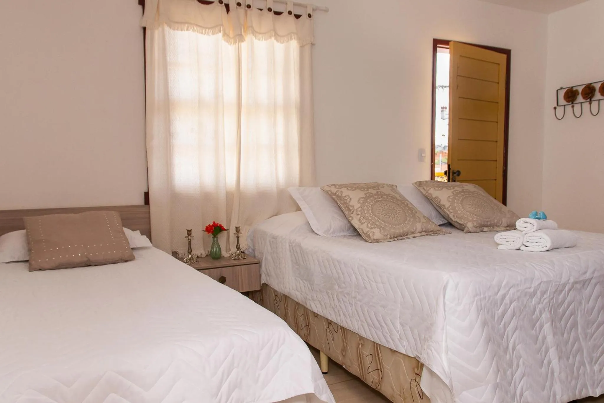 Photo of the whole room, Bed in Pousada Tesouro de Minas - Centro Histórico