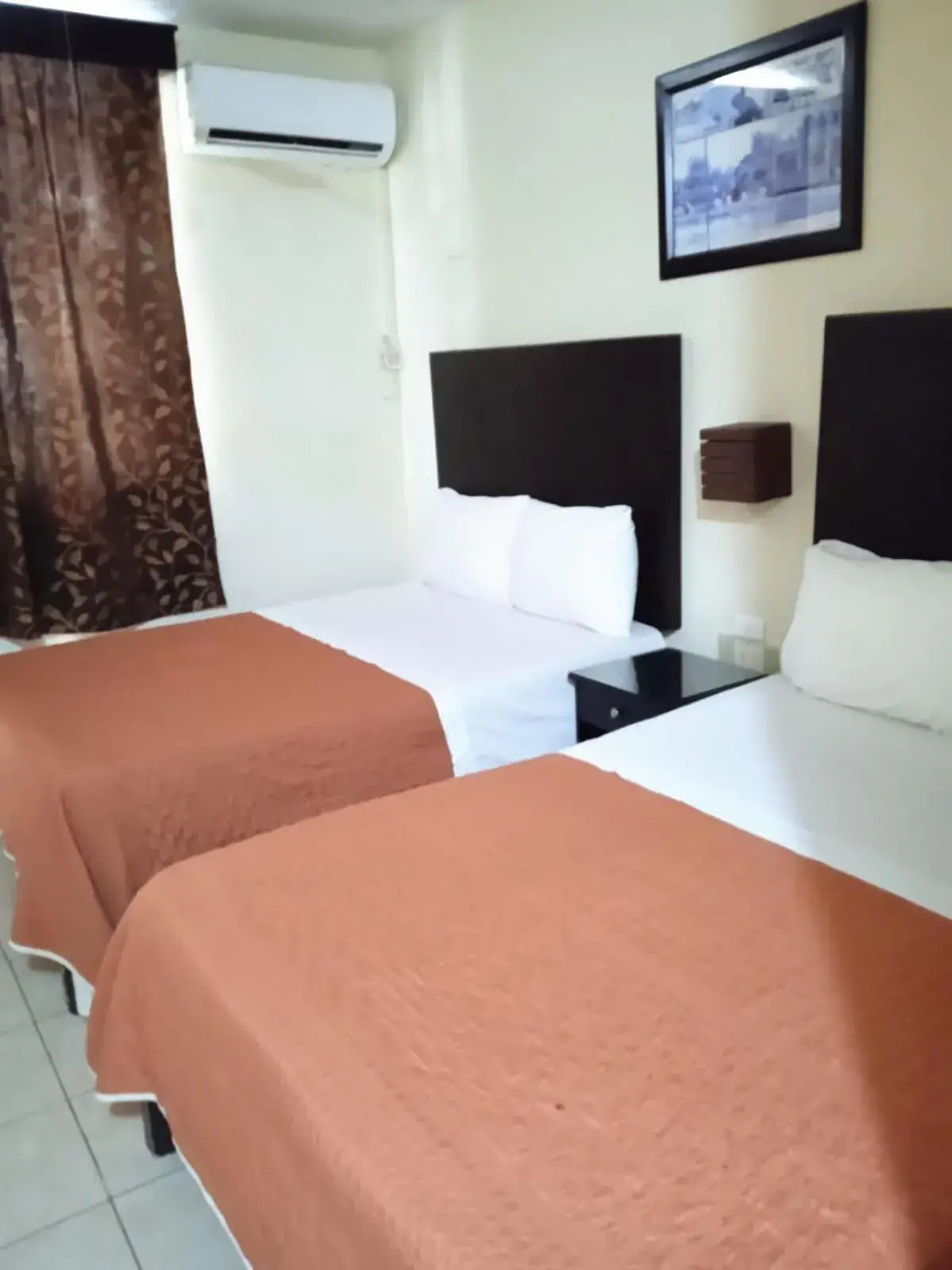 Standard Double Room with Two Double Beds in Hotel Maria Elena Standard Double Room with Two Double Beds in Hotel Maria Elena