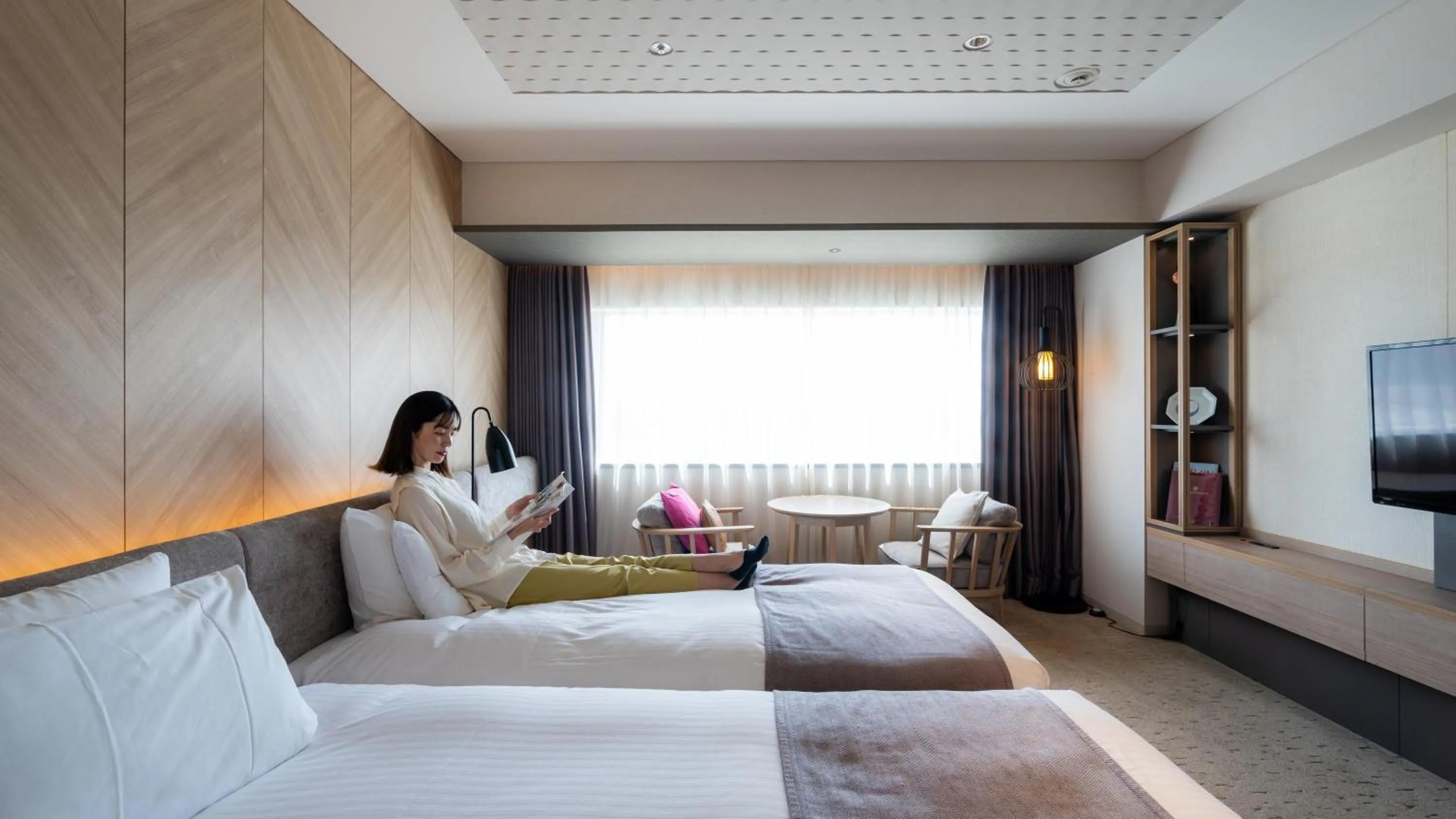 Photo of the whole room, Bed in Solaria Nishitetsu Hotel Fukuoka