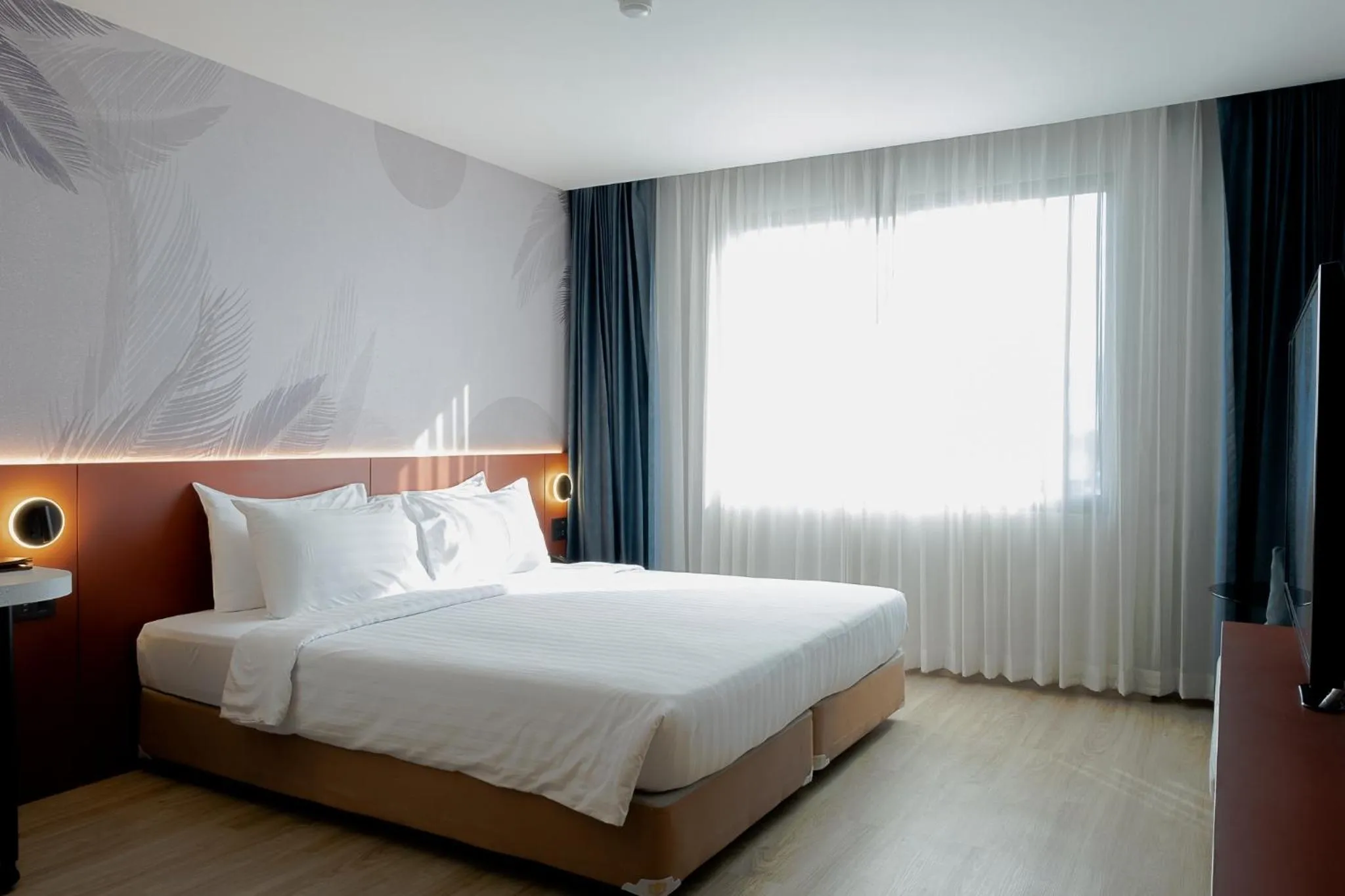 Bed in Buri Sriphu Hotel