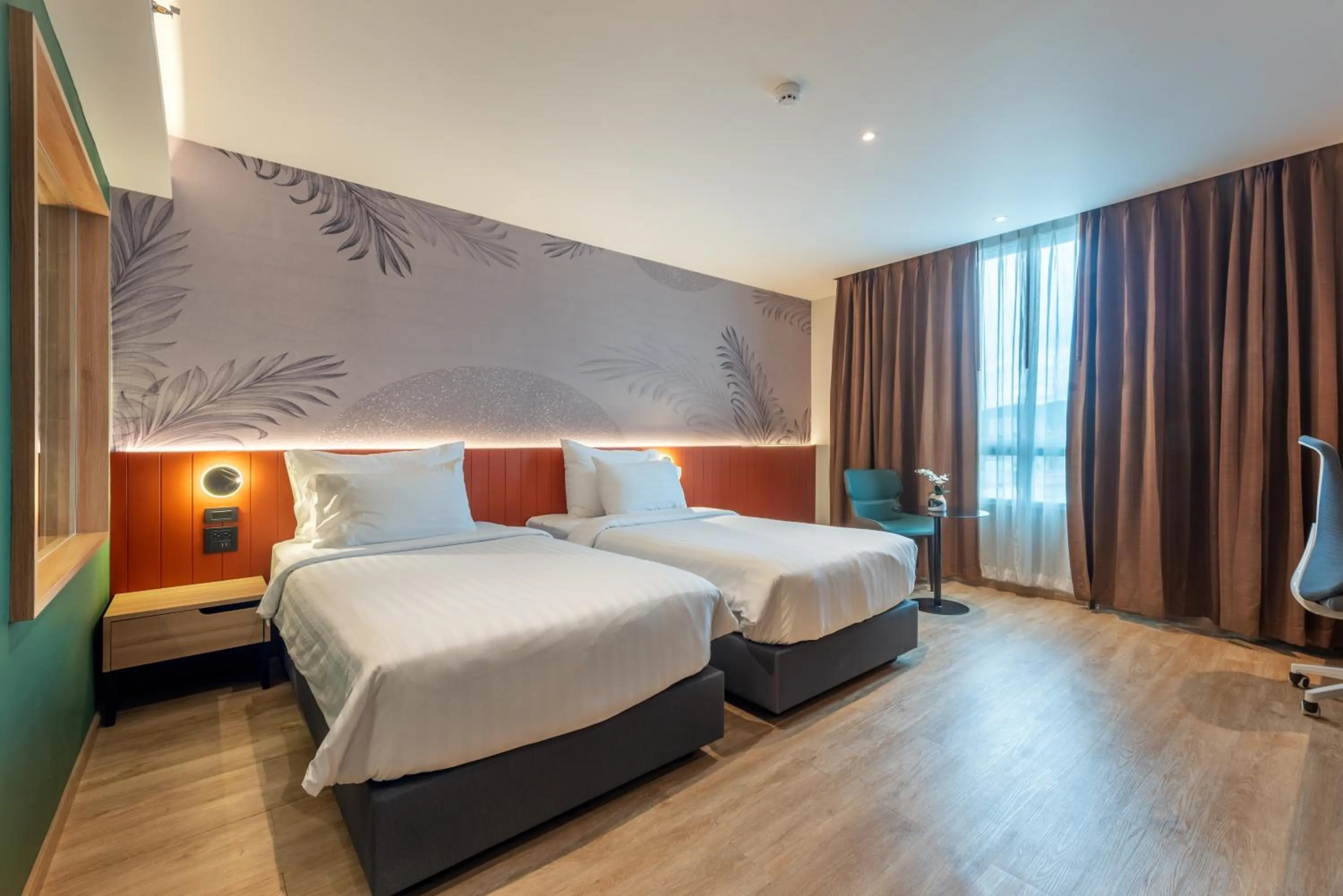 Bed in Buri Sriphu Hotel