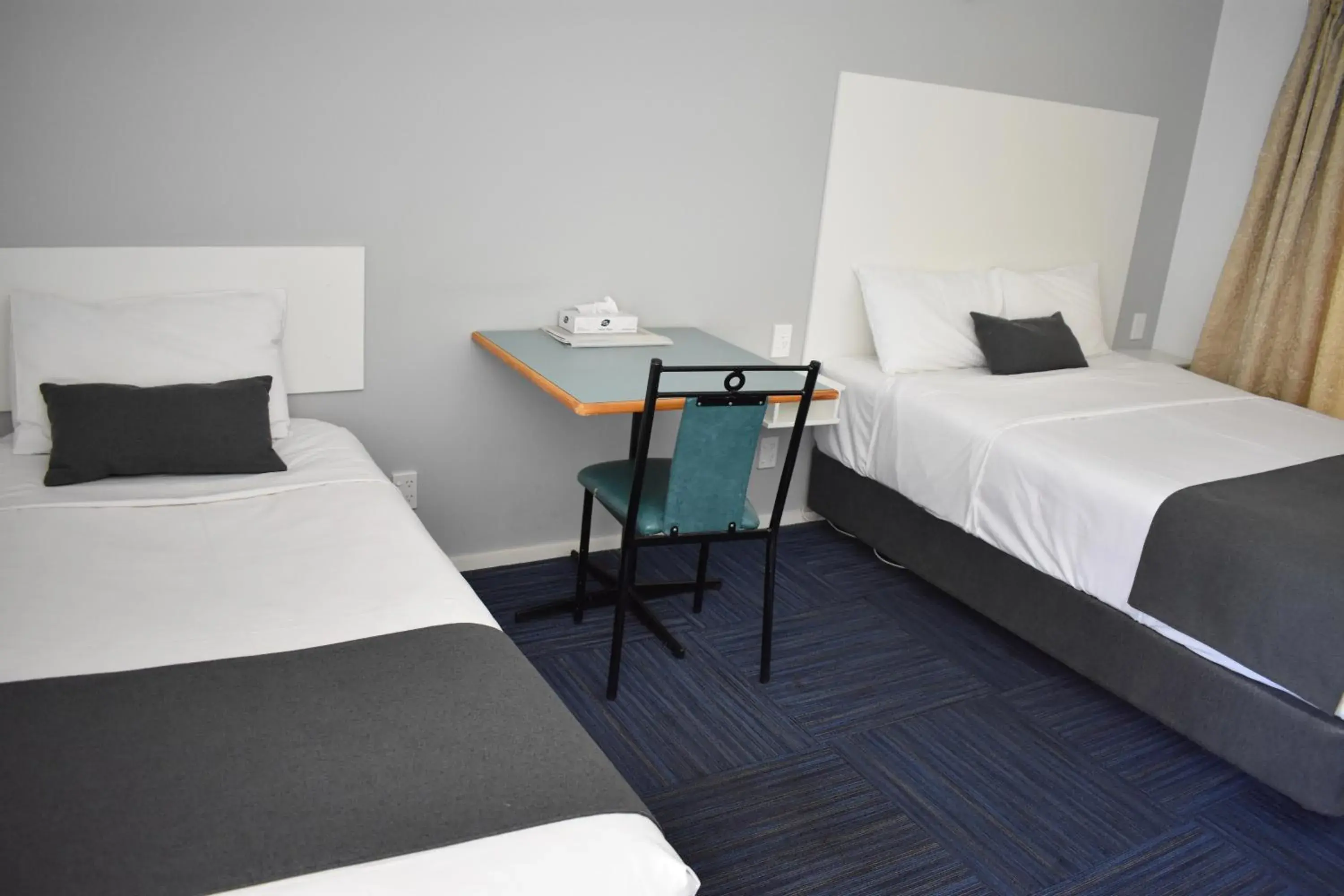 Bed in Riviana Motel Bed in Riviana Motel