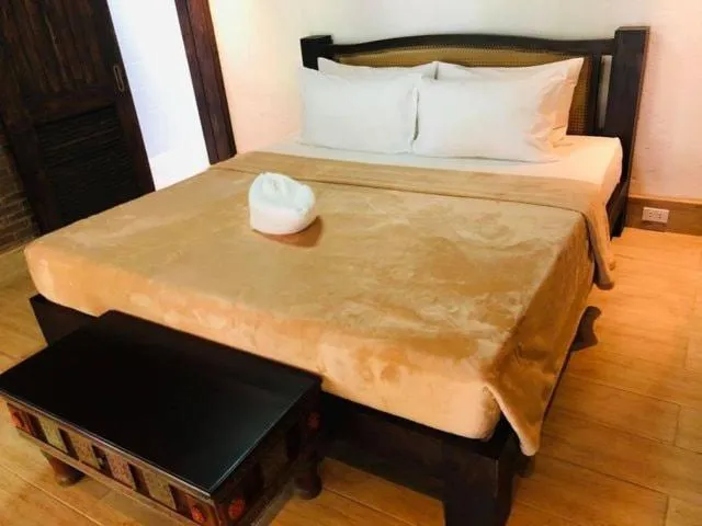 Bed in Chema's by the Sea