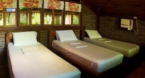 Bed in Chema's by the Sea