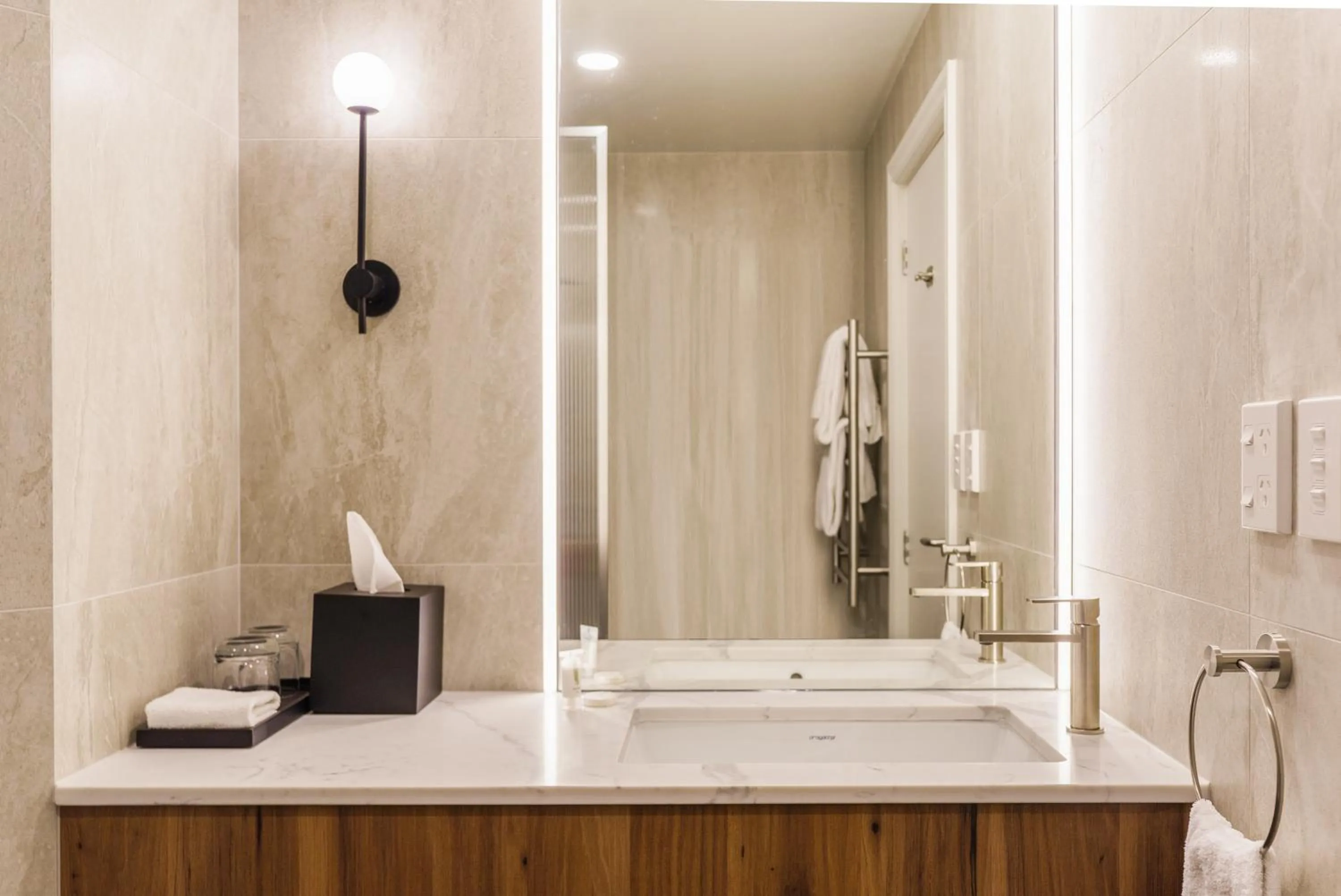 Bathroom in Parkside Hotel & Apartments