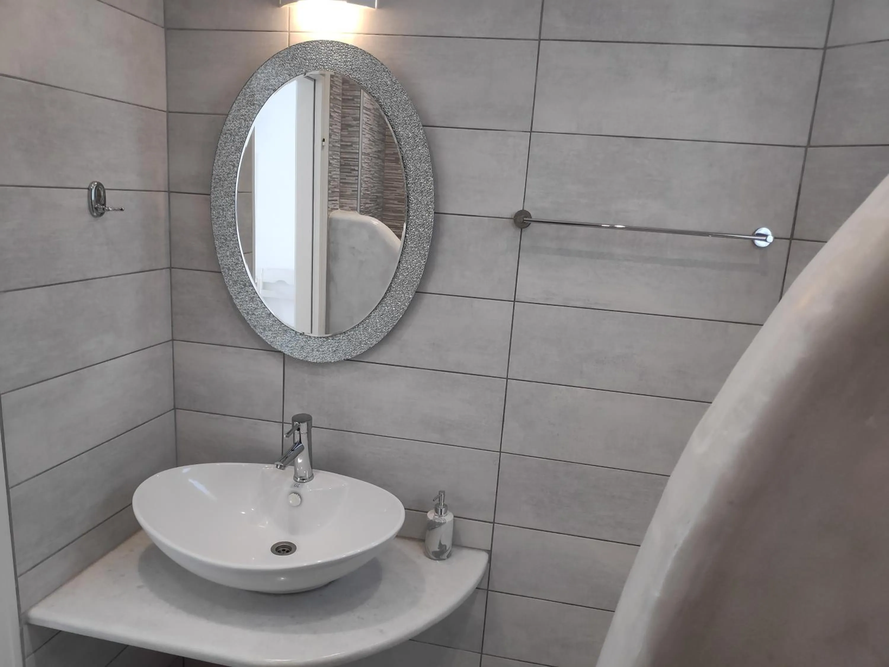Bathroom in Augusta Studios & Apartments
