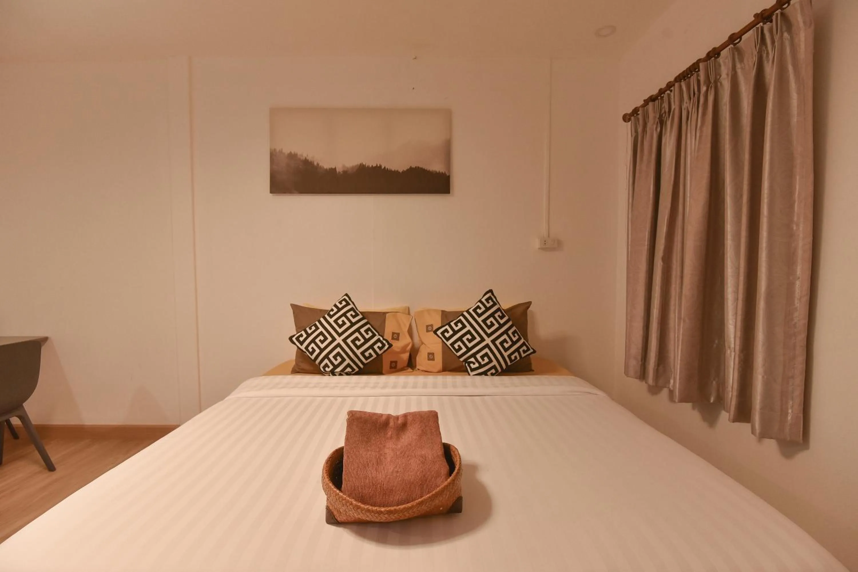 Bed in P.U. Inn Resort