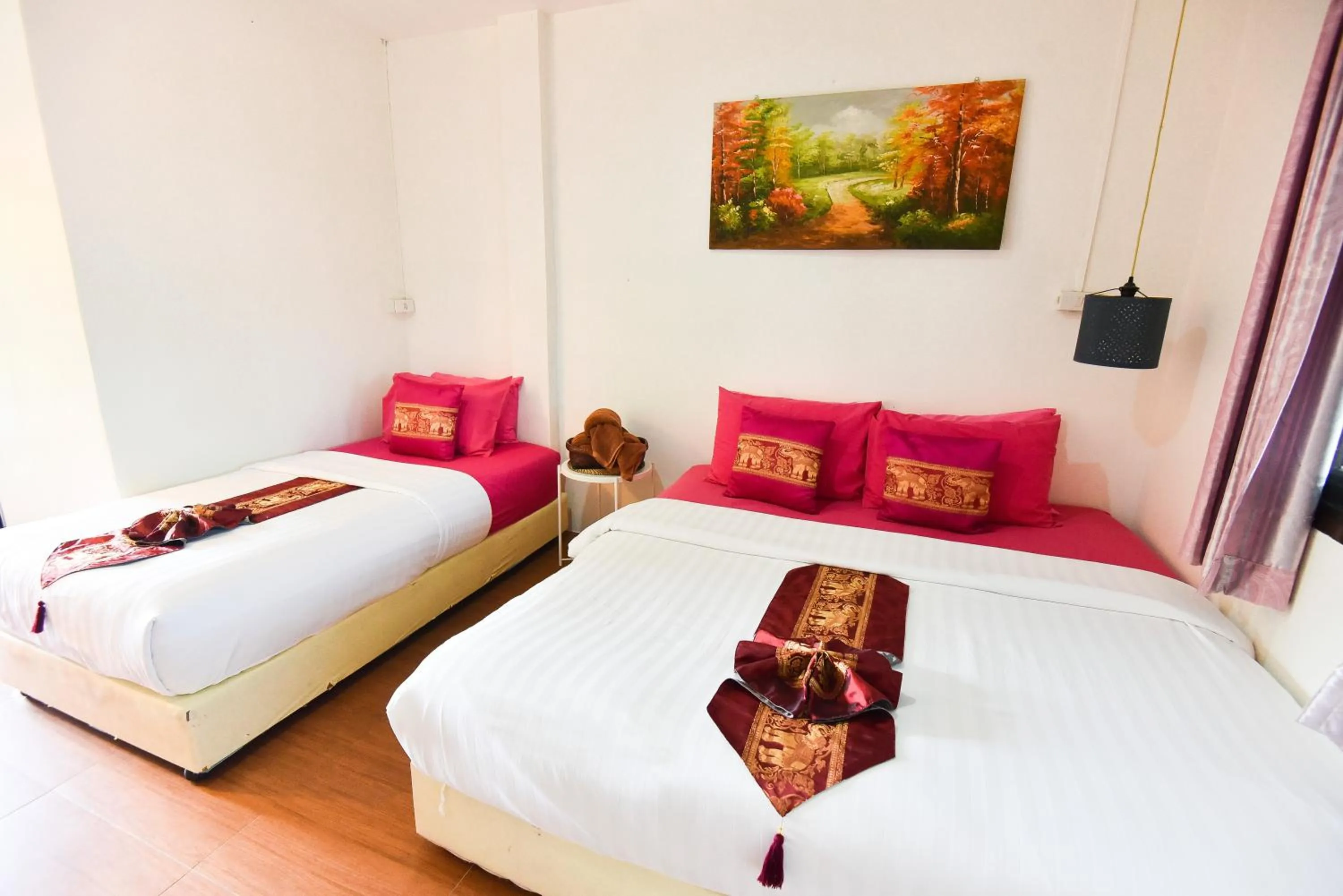 Photo of the whole room, Bed in P.U. Inn Resort