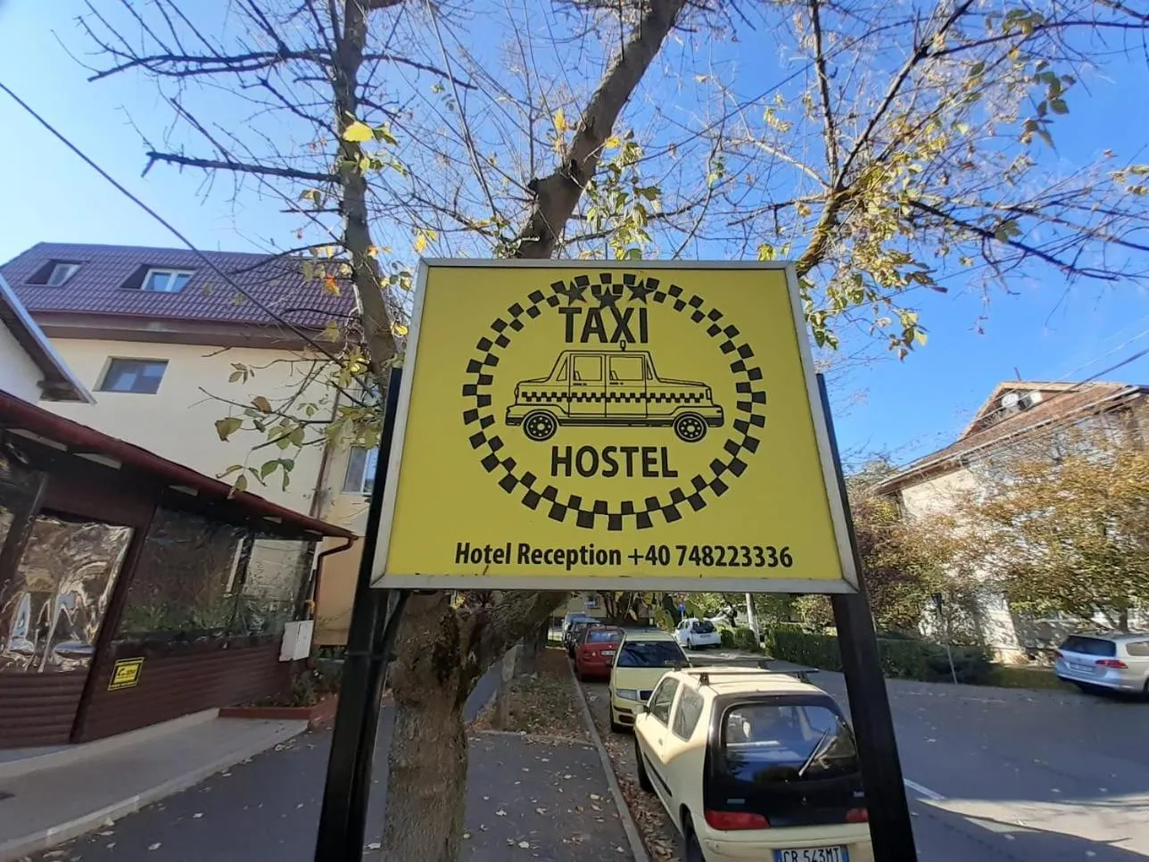 Property logo or sign in Taxi Hostel