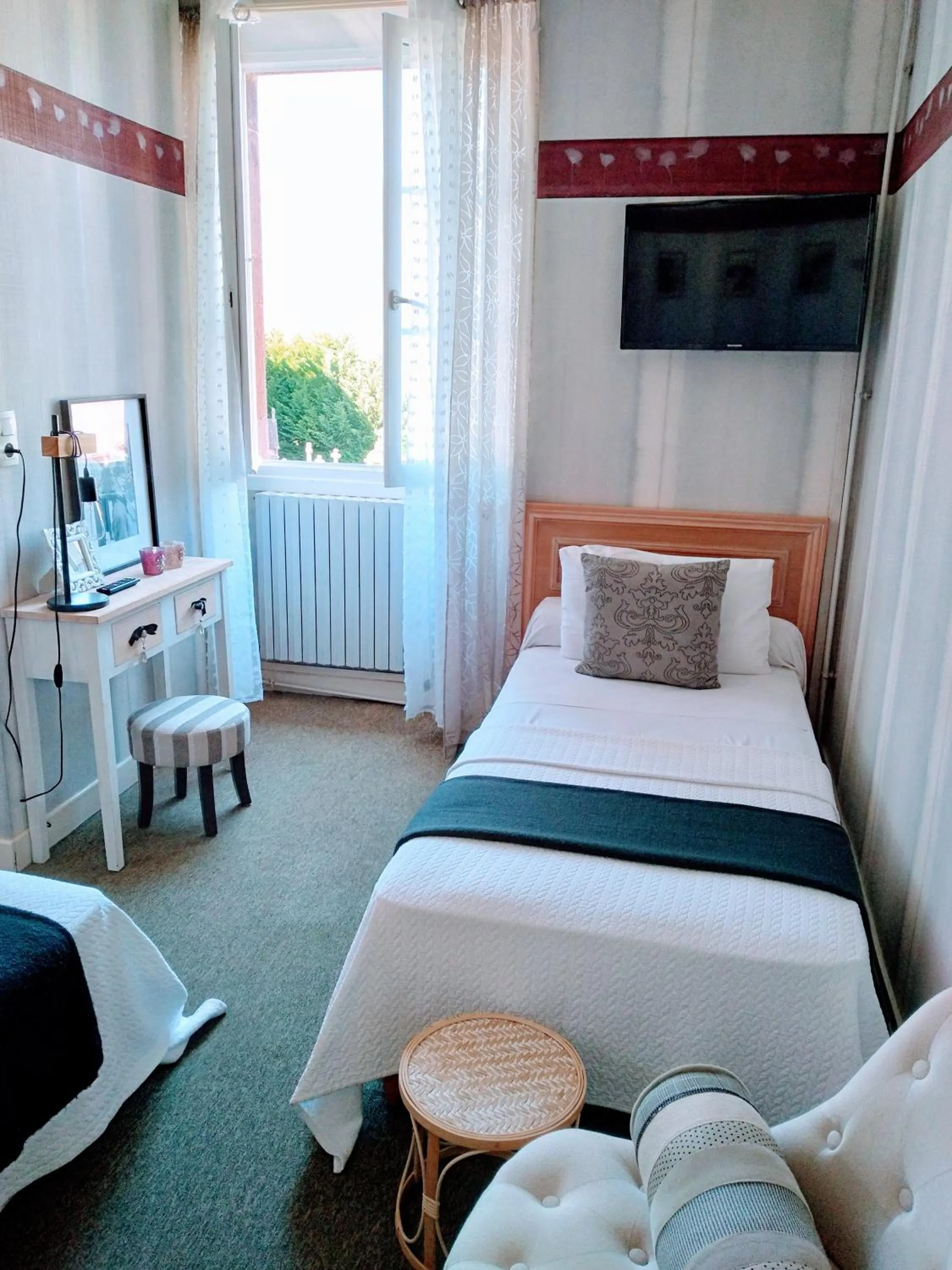 Bedroom in Hôtel Camou