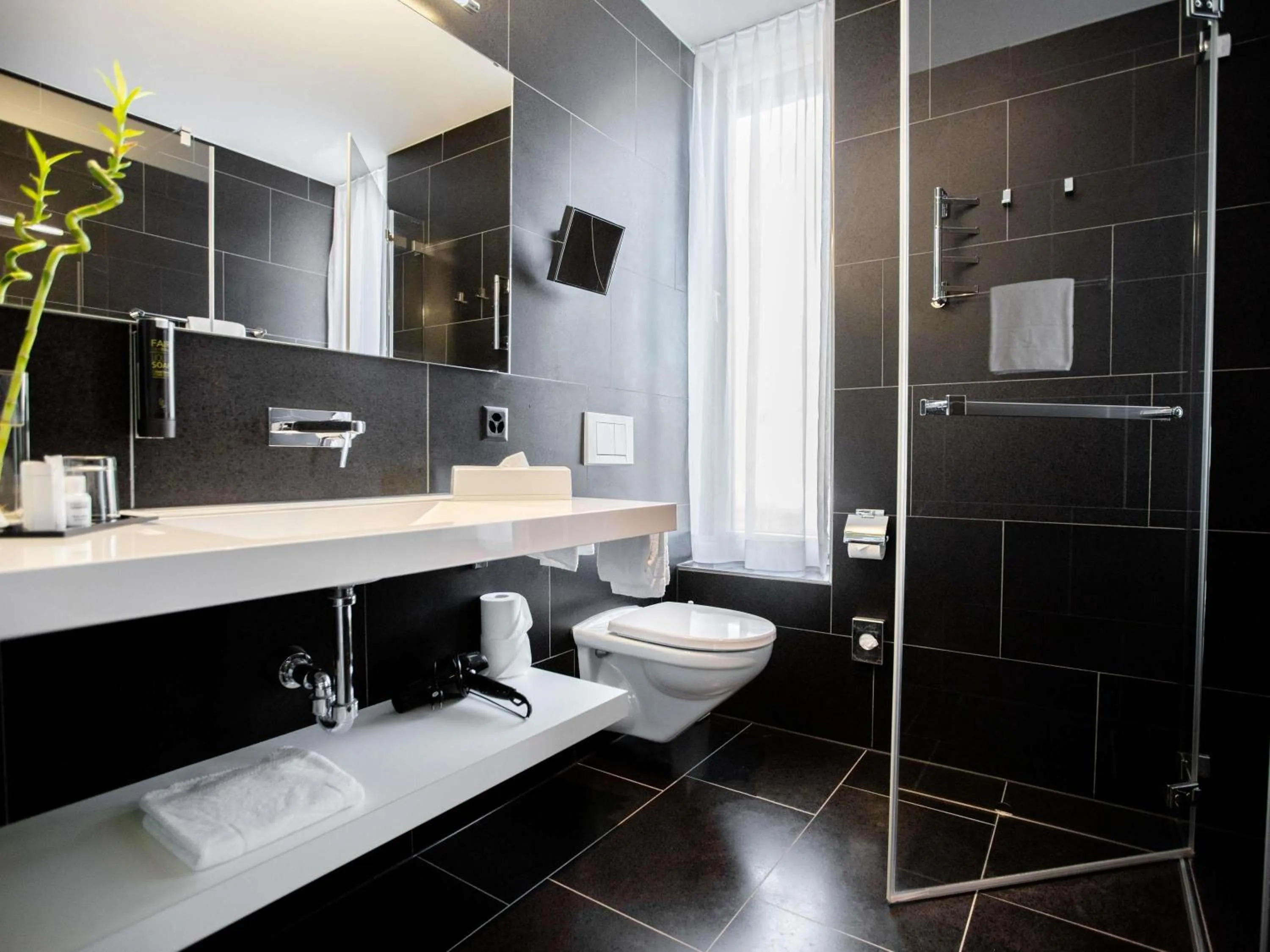 Bedroom in Mercure Chur City West