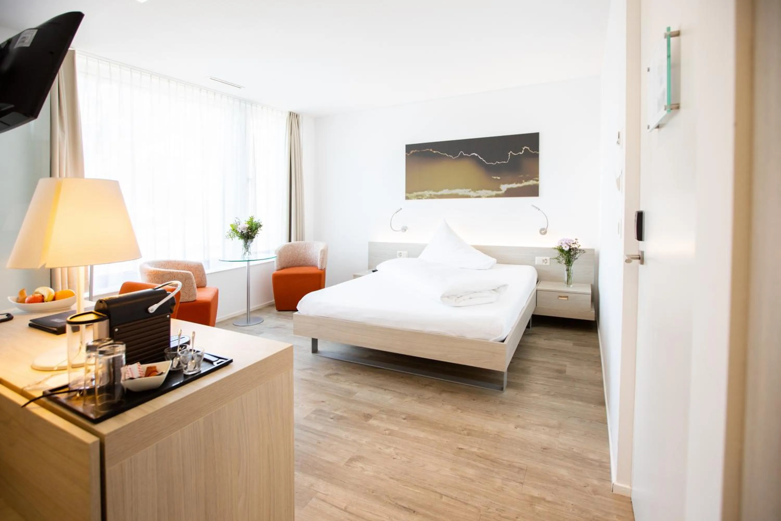 Photo of the whole room, Bed in Mercure Chur City West