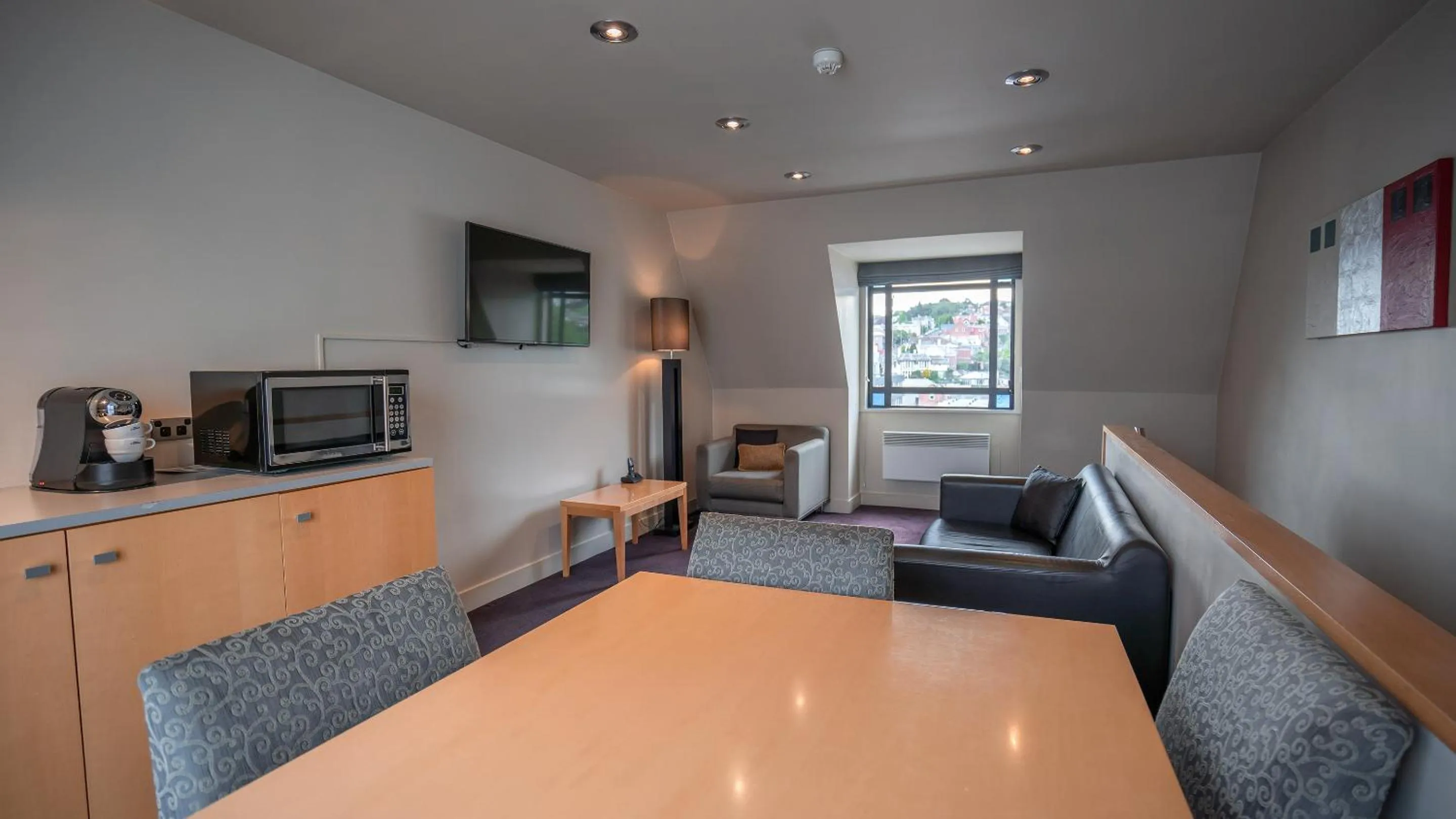 Living room in Scenic Hotel Southern Cross