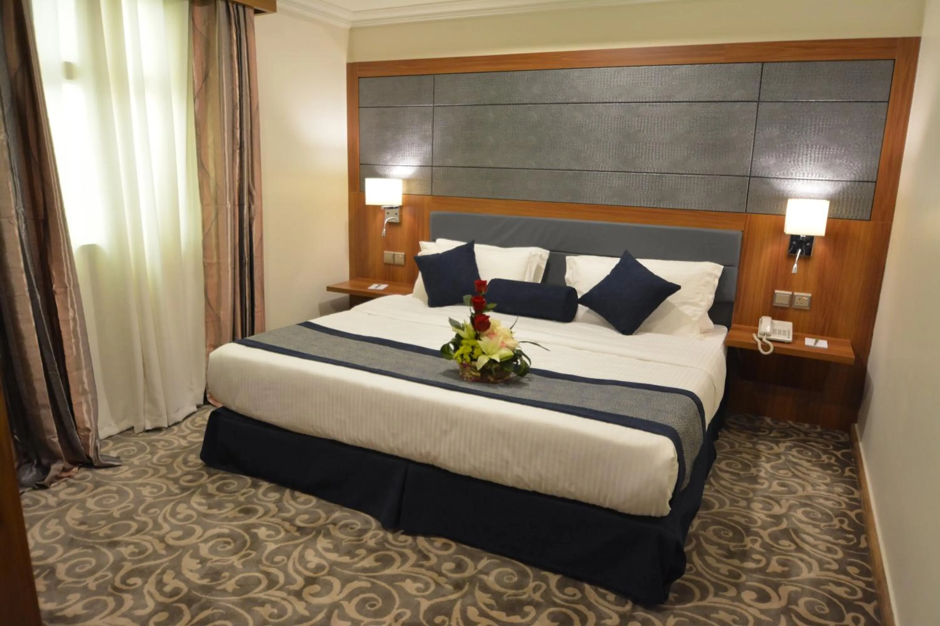 Bed in Grandeur East فخامة الشرق للشقق المخدومة