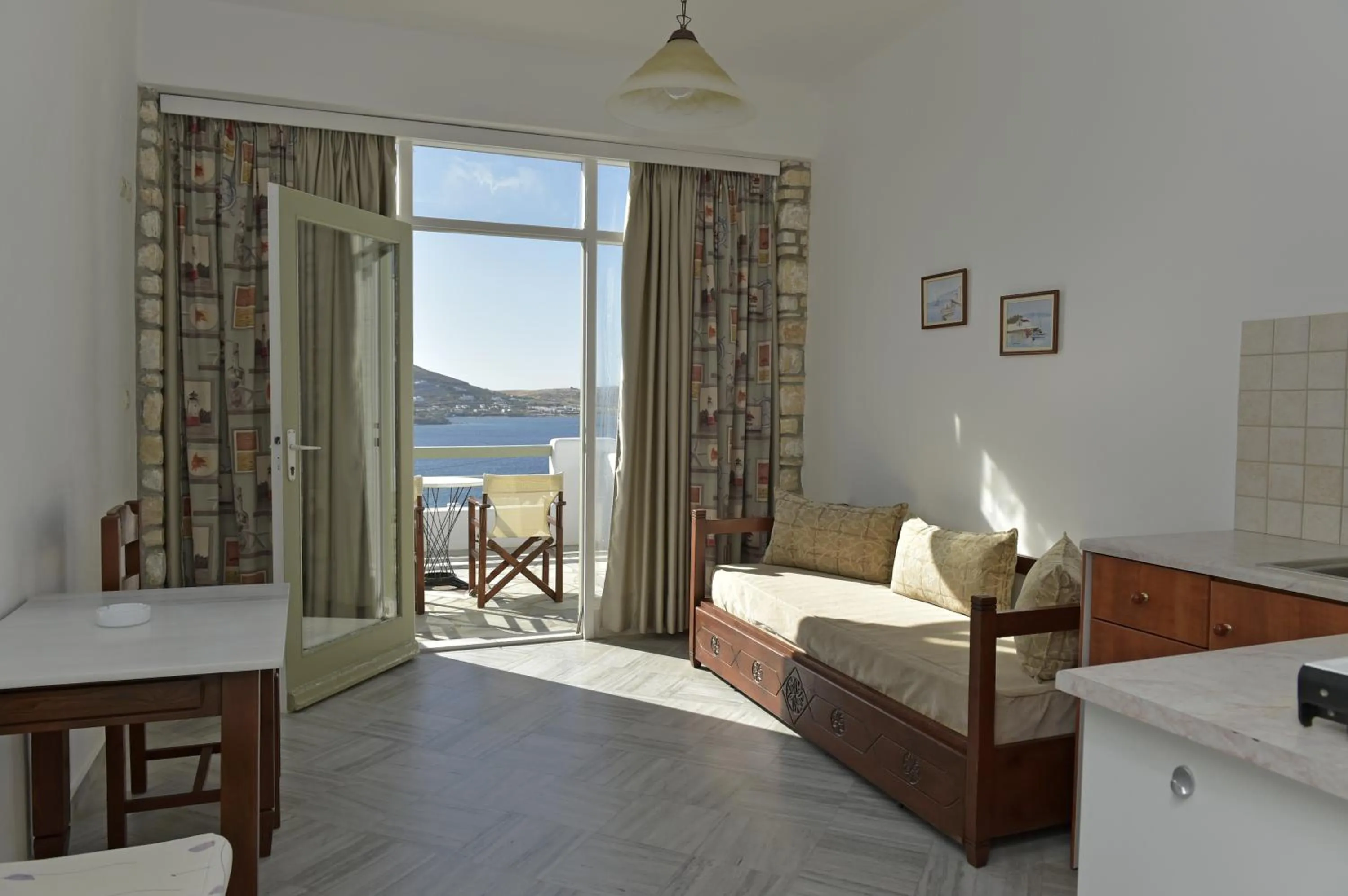 Kitchen or kitchenette in Hara Studios and Apartments