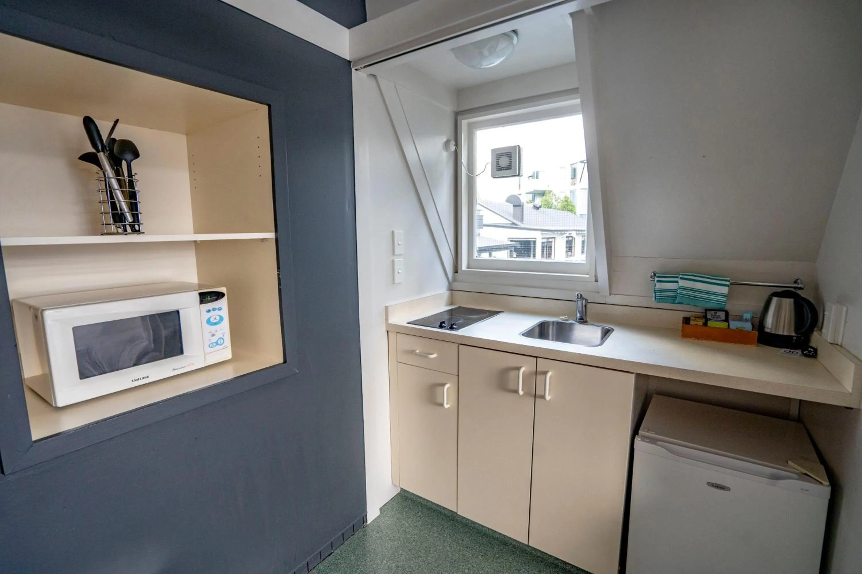 Kitchen or kitchenette in Heartland Hotel Queenstown