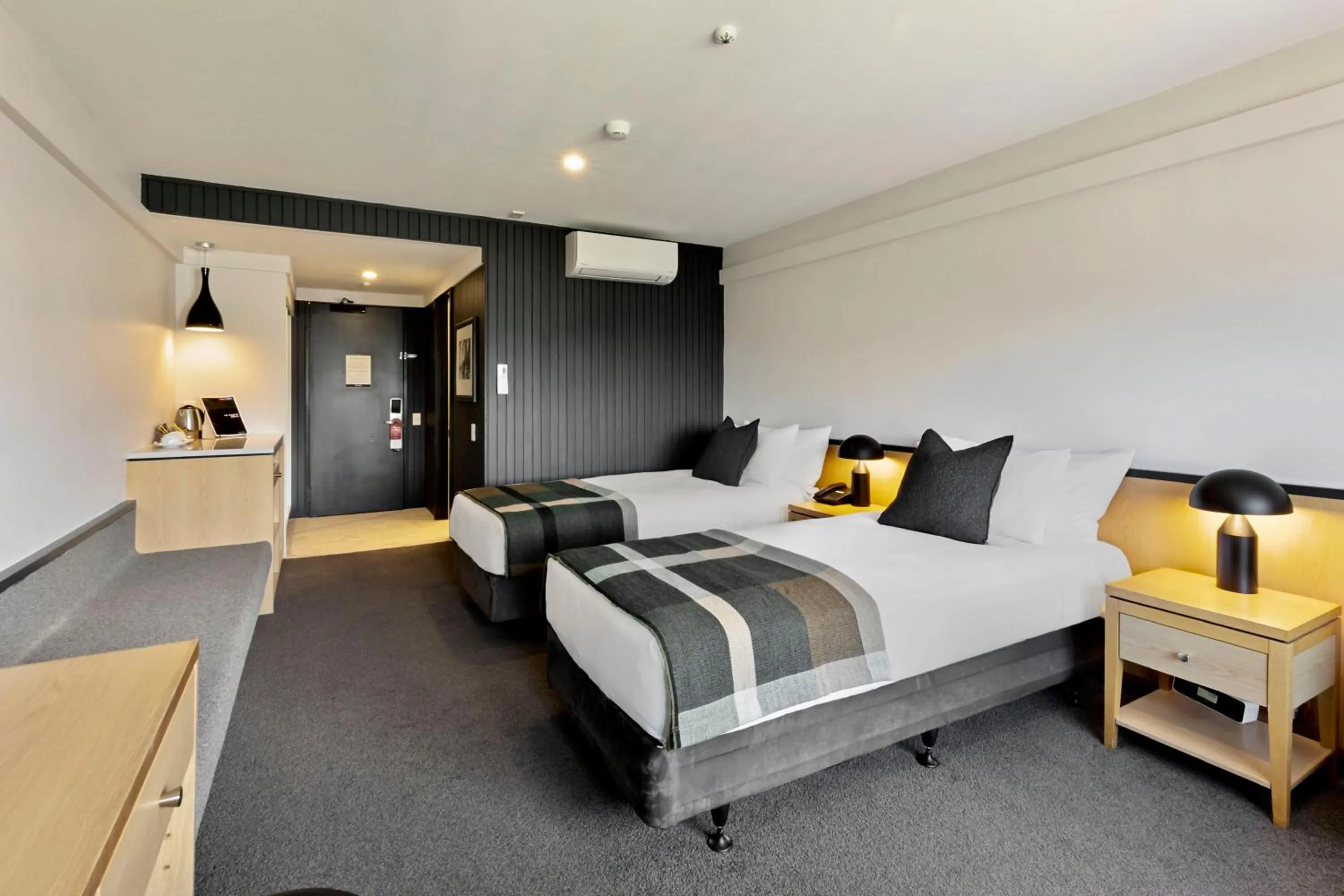 Bed in Heartland Hotel Queenstown