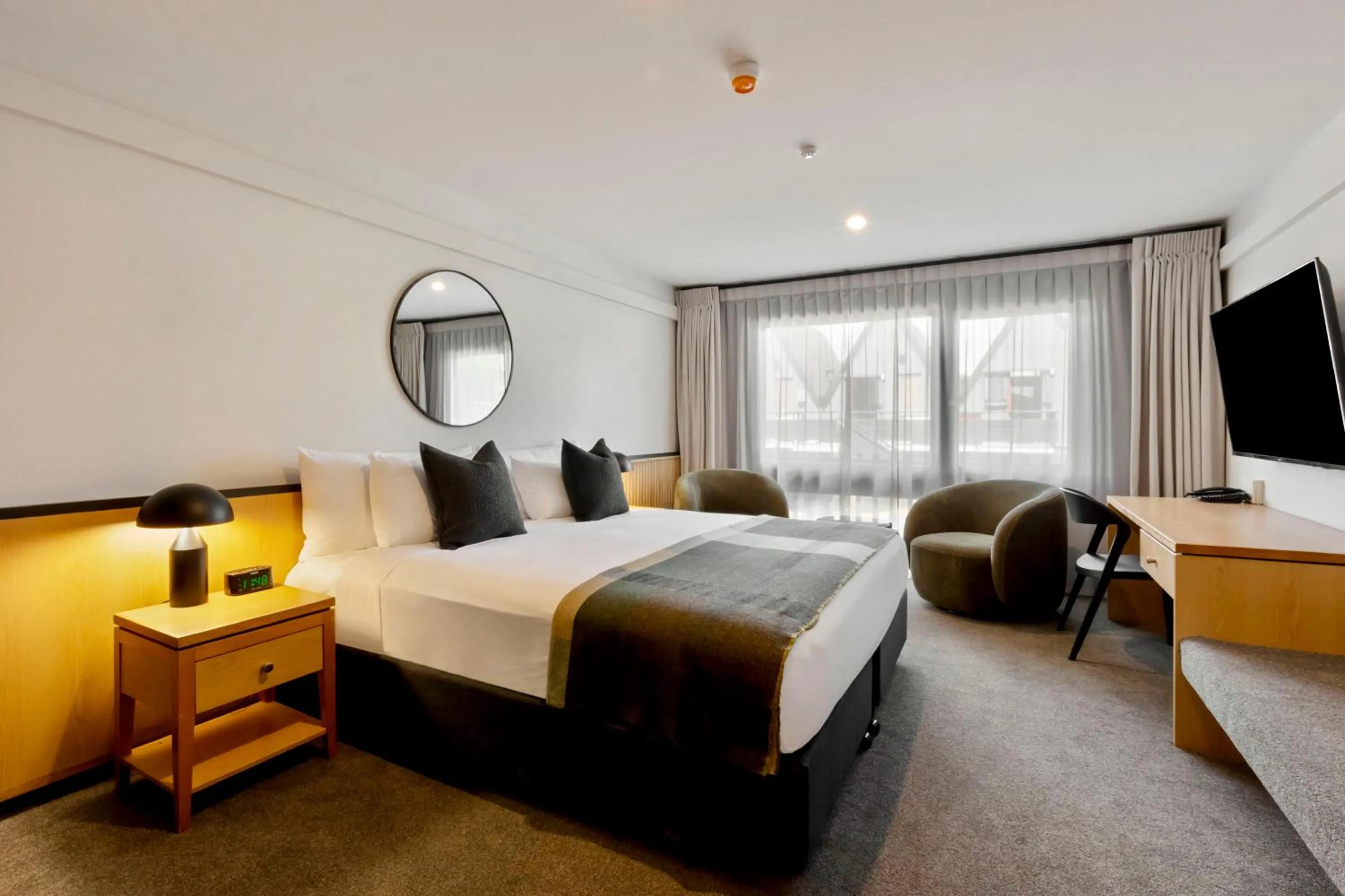 Bed in Heartland Hotel Queenstown