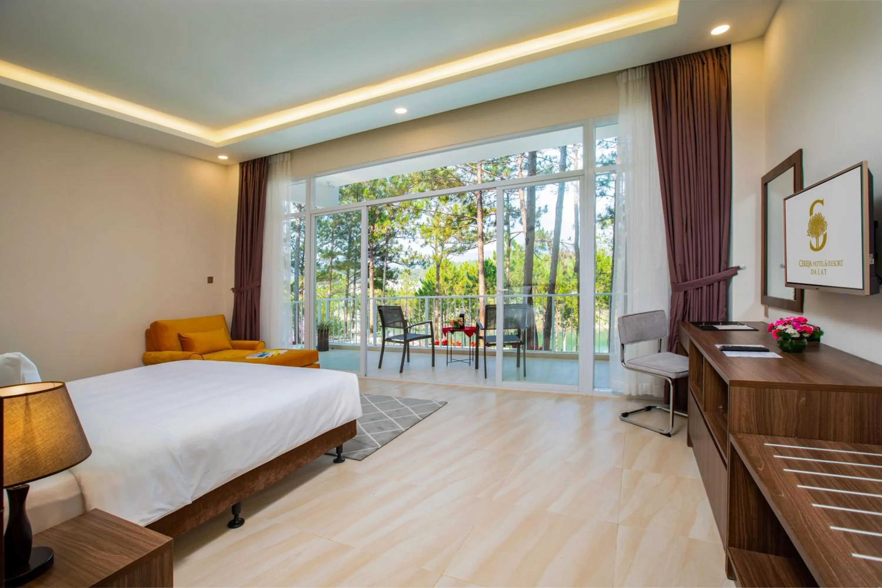 Photo of the whole room, Bed in CEREJA Hotel & Resort Dalat