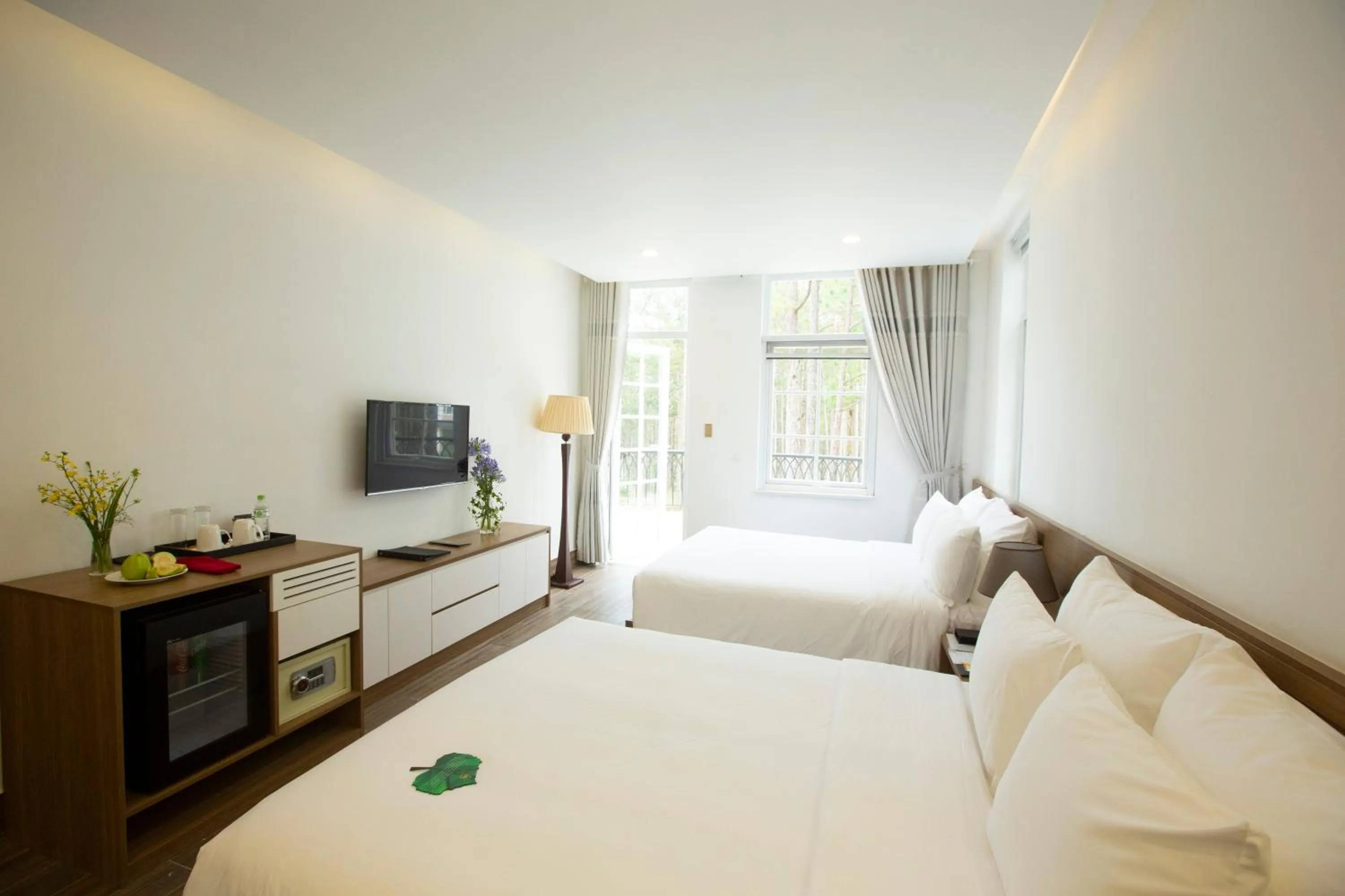 Photo of the whole room, Bed in CEREJA Hotel & Resort Dalat