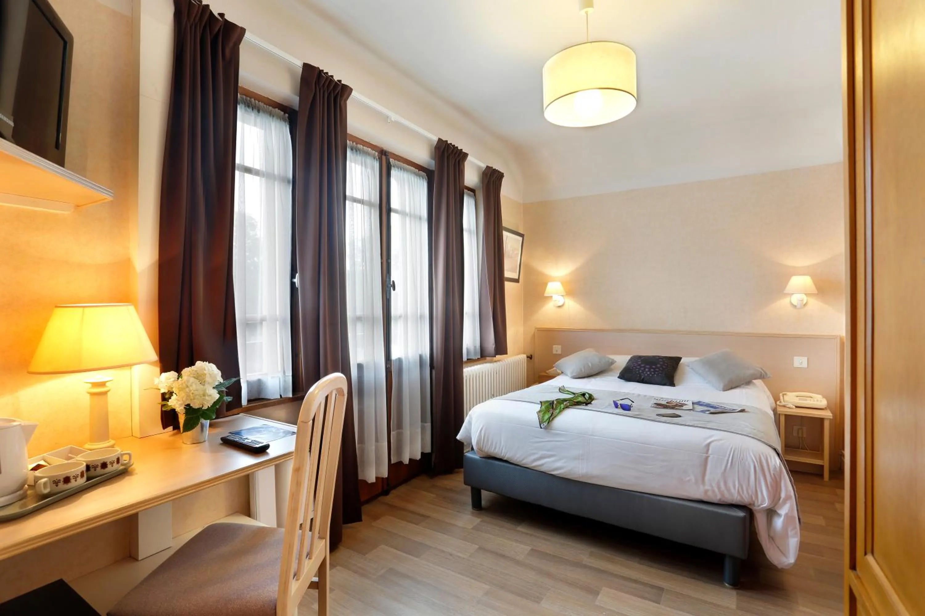 Photo of the whole room, Bed in HOTEL LES MARRONNIERS