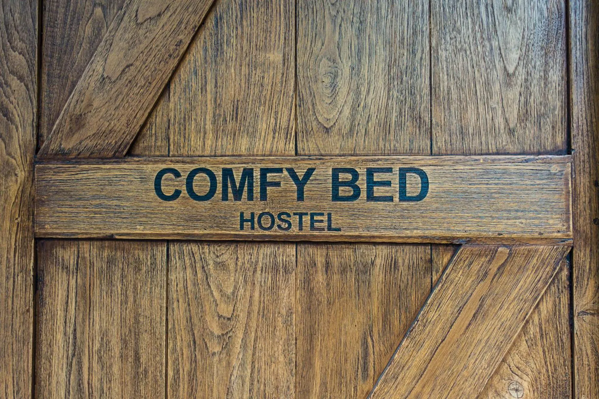 Property logo or sign in Comfy Bed Hostel