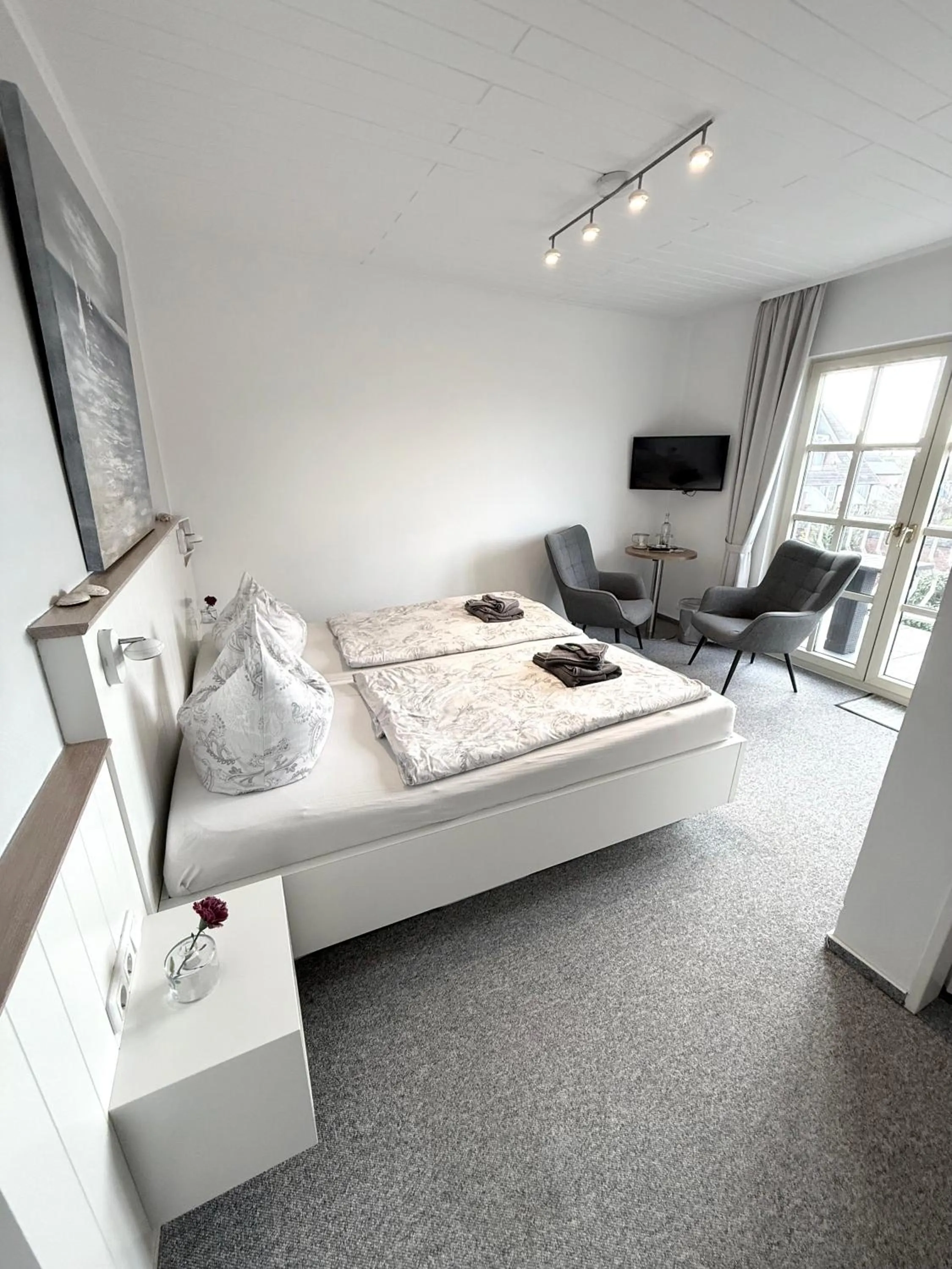 Photo of the whole room, Bed in Hotel garni Seeluft Büsum