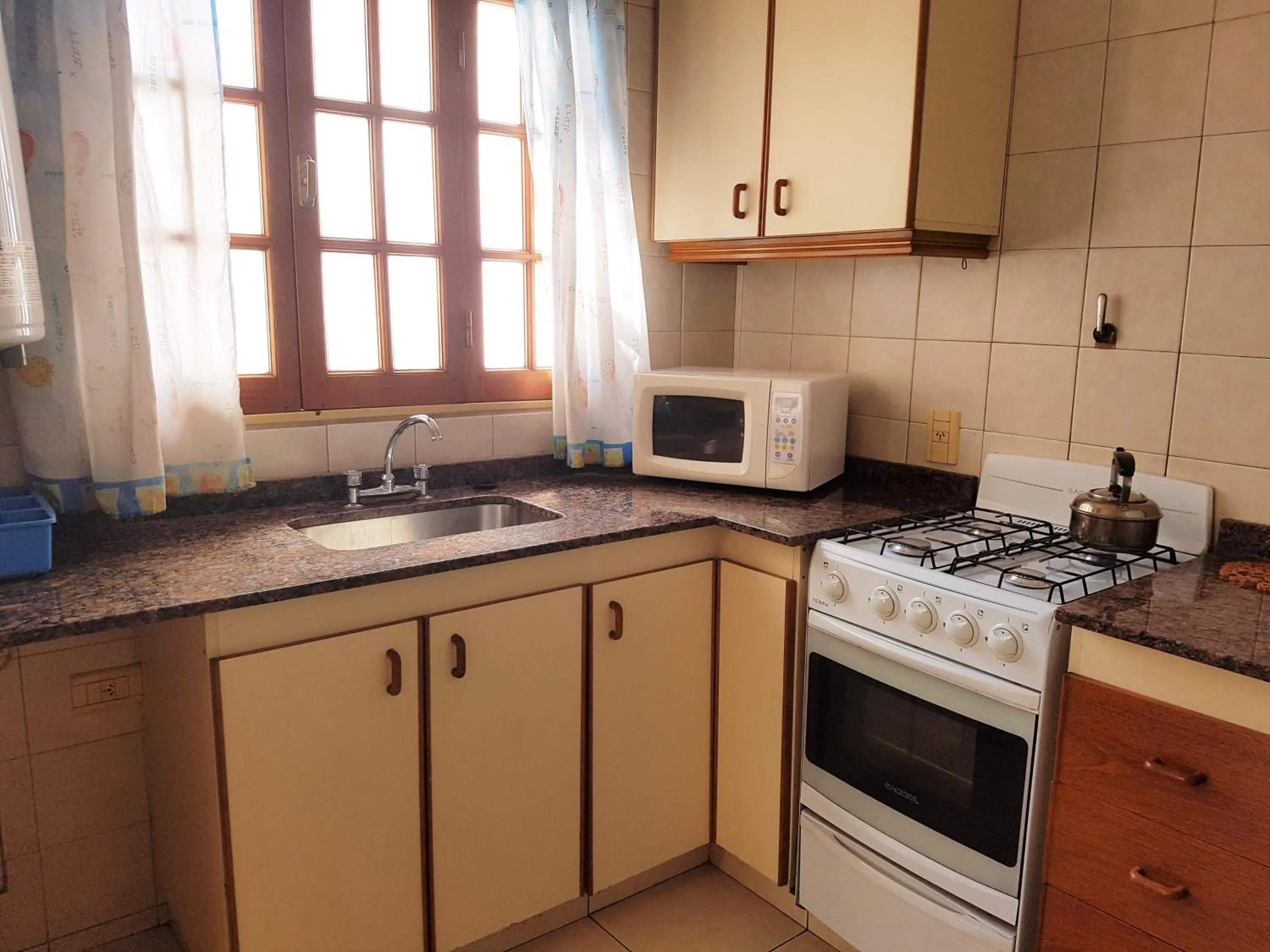 Kitchen or kitchenette in Azul Departamentos