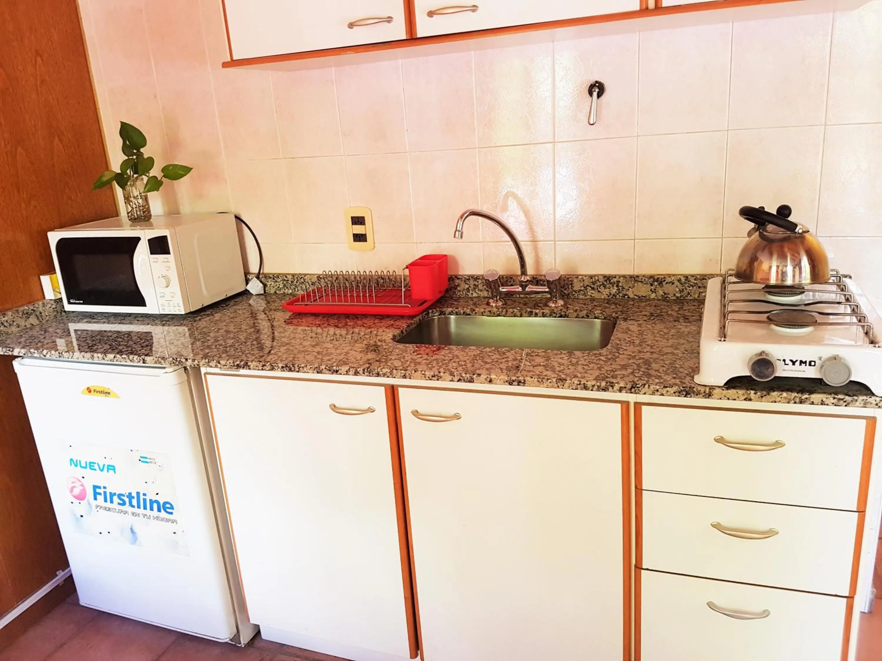 Kitchen or kitchenette in Azul Departamentos