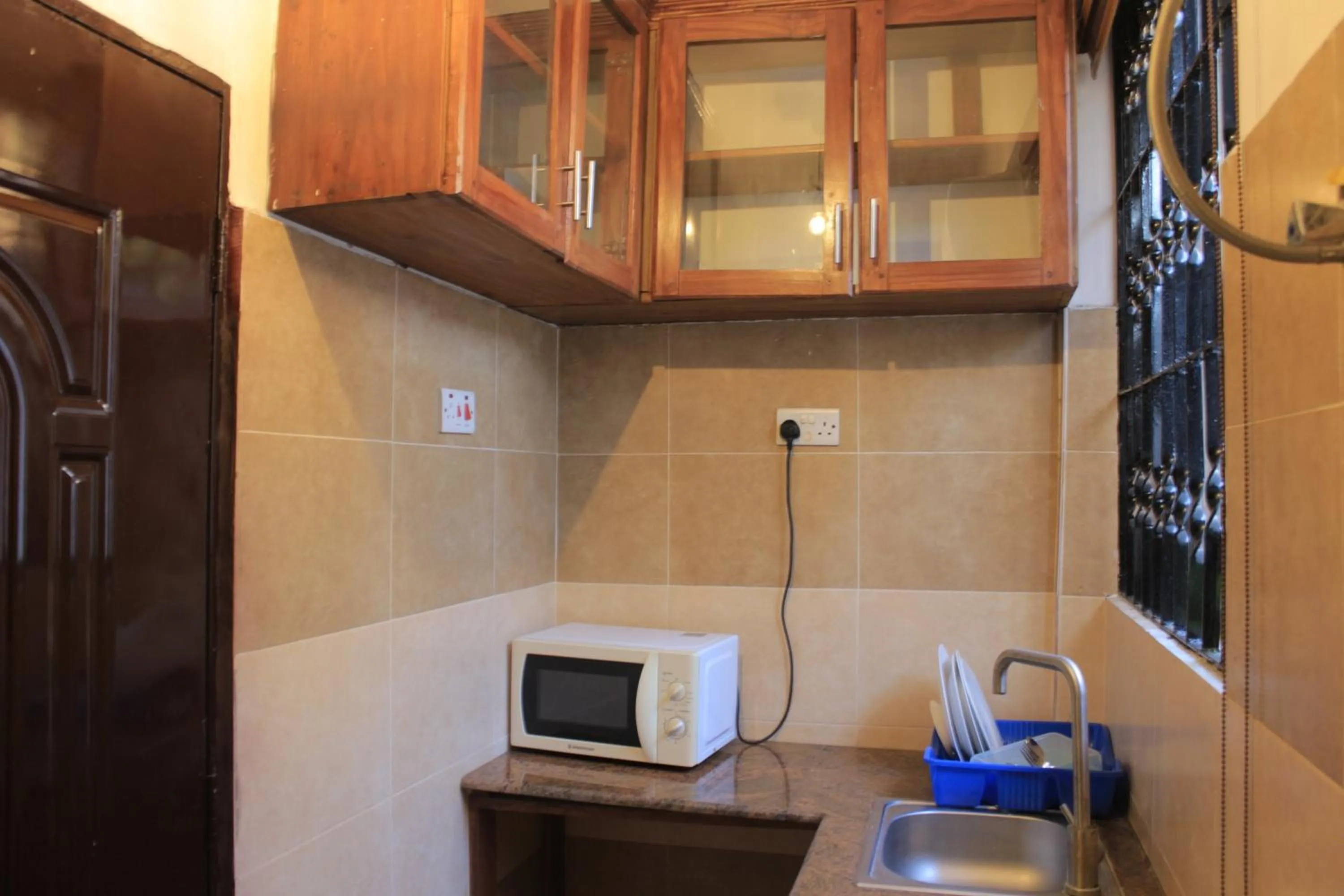 Kitchen or kitchenette in Mikocheni Condo Hotel & Apartments
