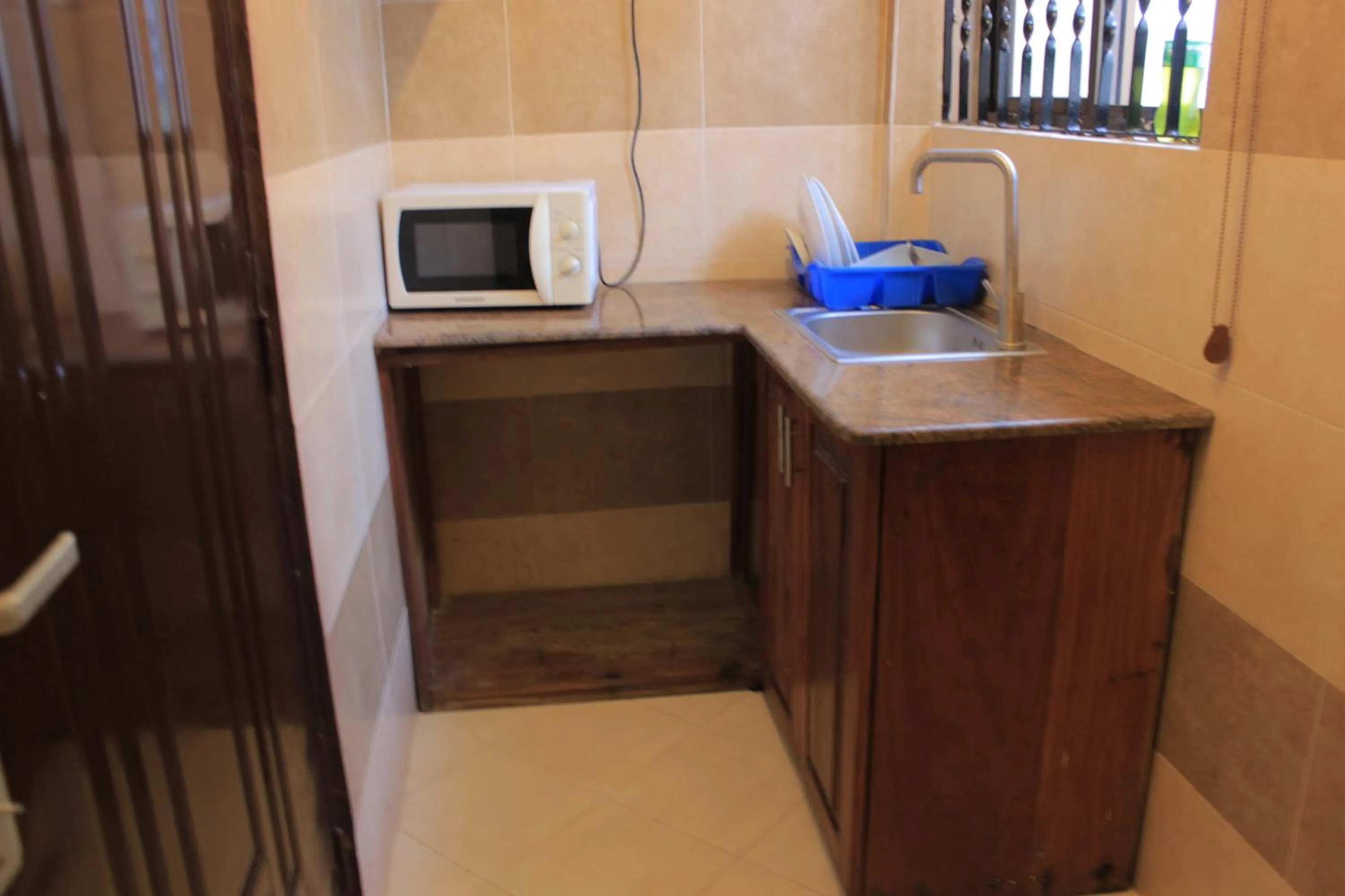 Kitchen or kitchenette in Mikocheni Condo Hotel & Apartments