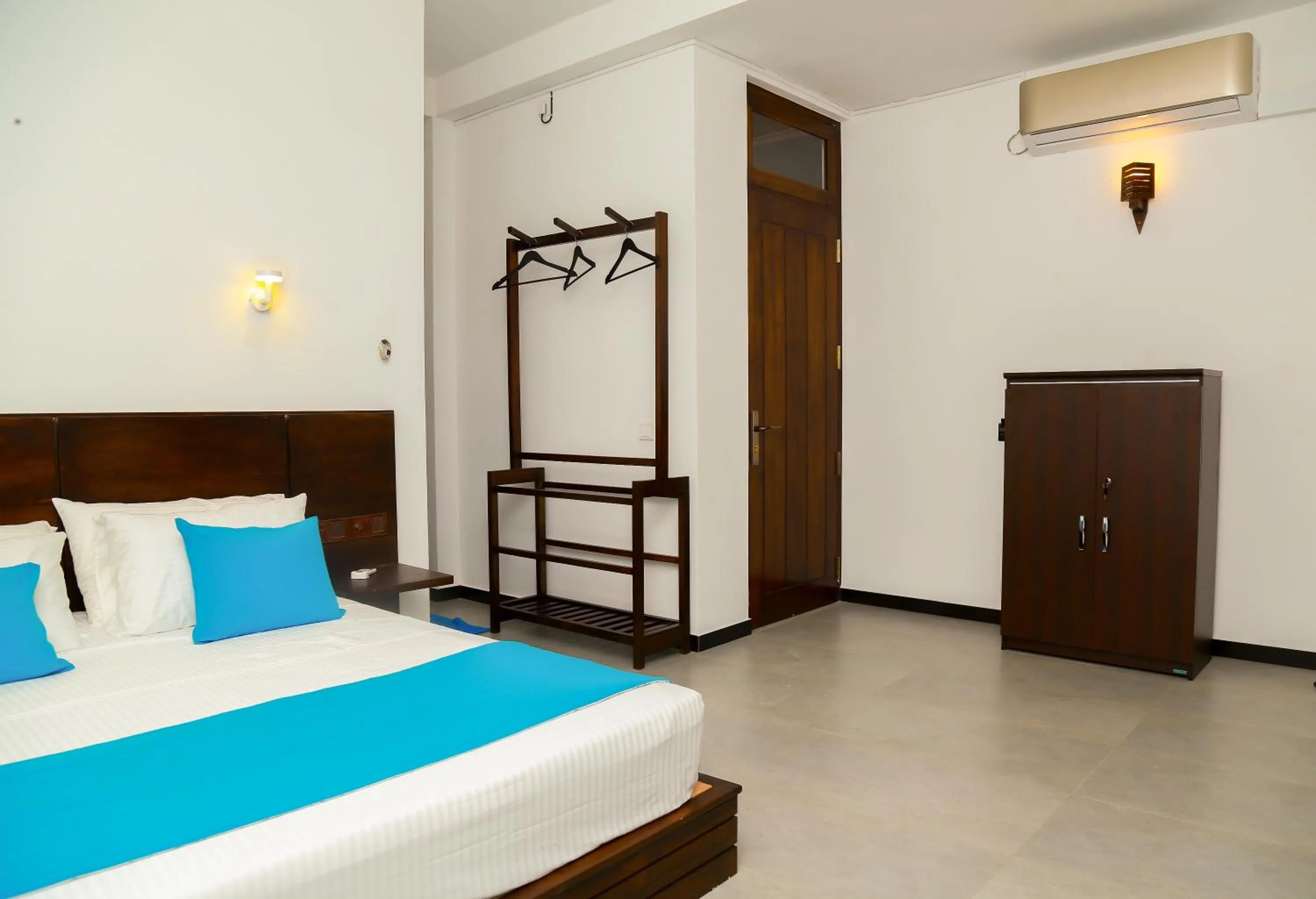 air conditioner, Bed in Seafood Restaurant and Motel