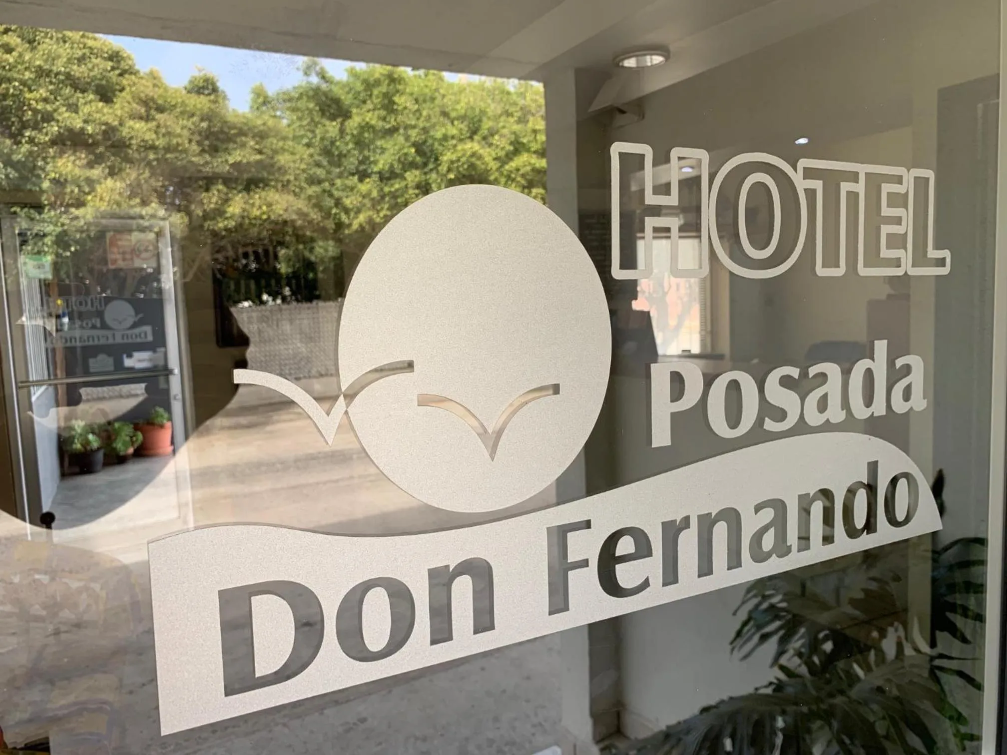 Property logo or sign in Hotel Posada Don Fernando