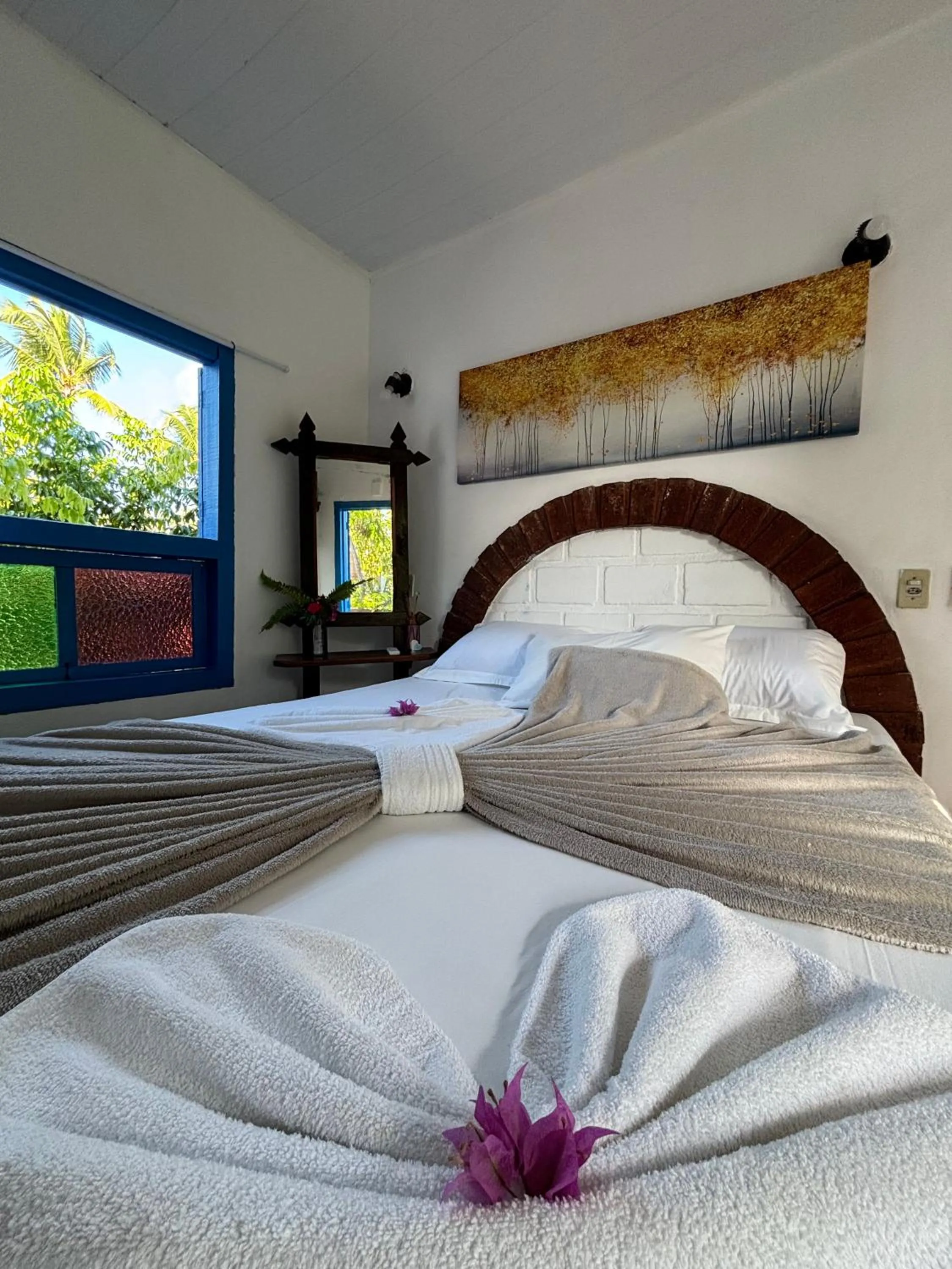 Bed in Pousada Lá na Magia