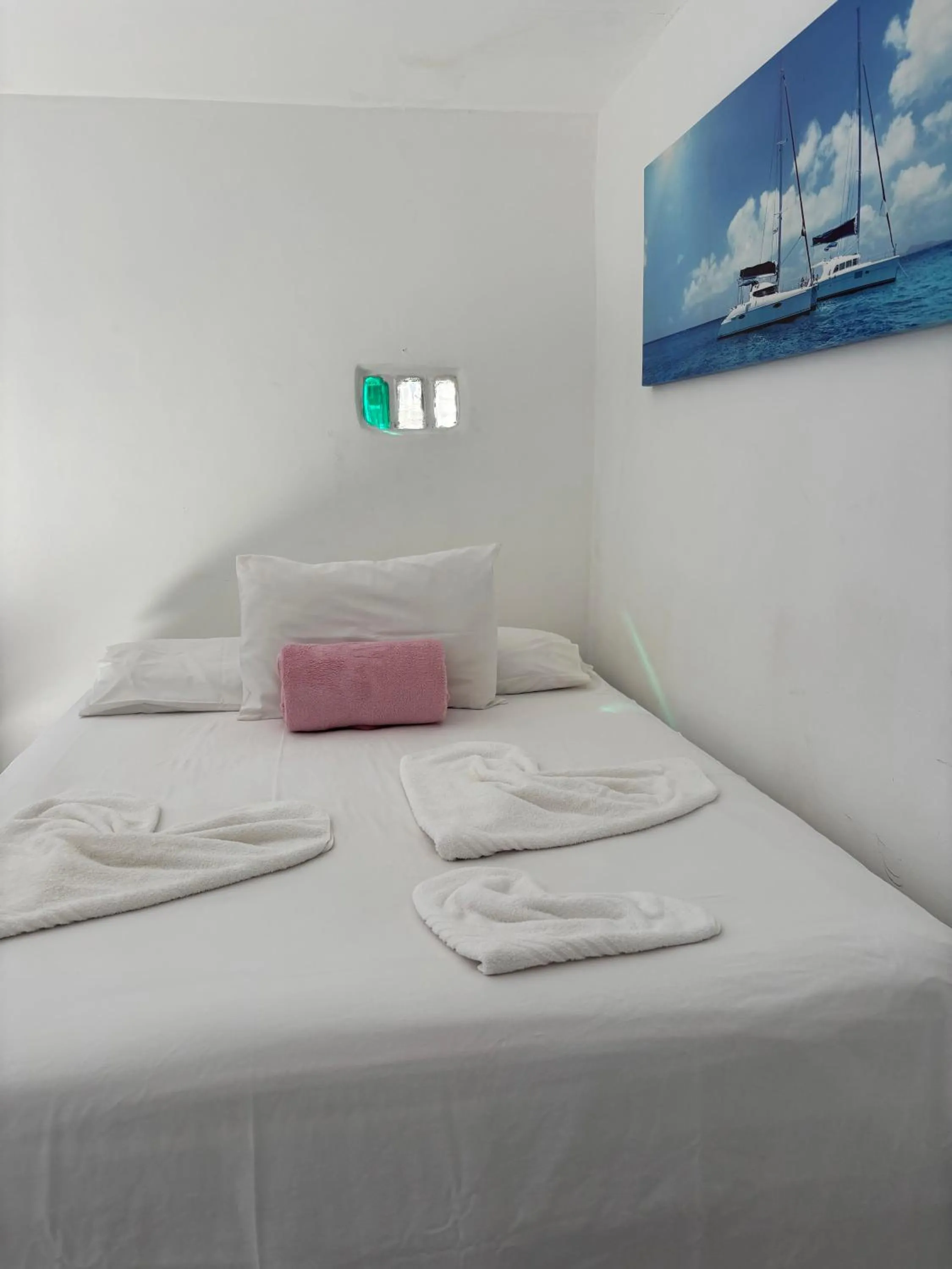 Bed in Pousada Lá na Magia