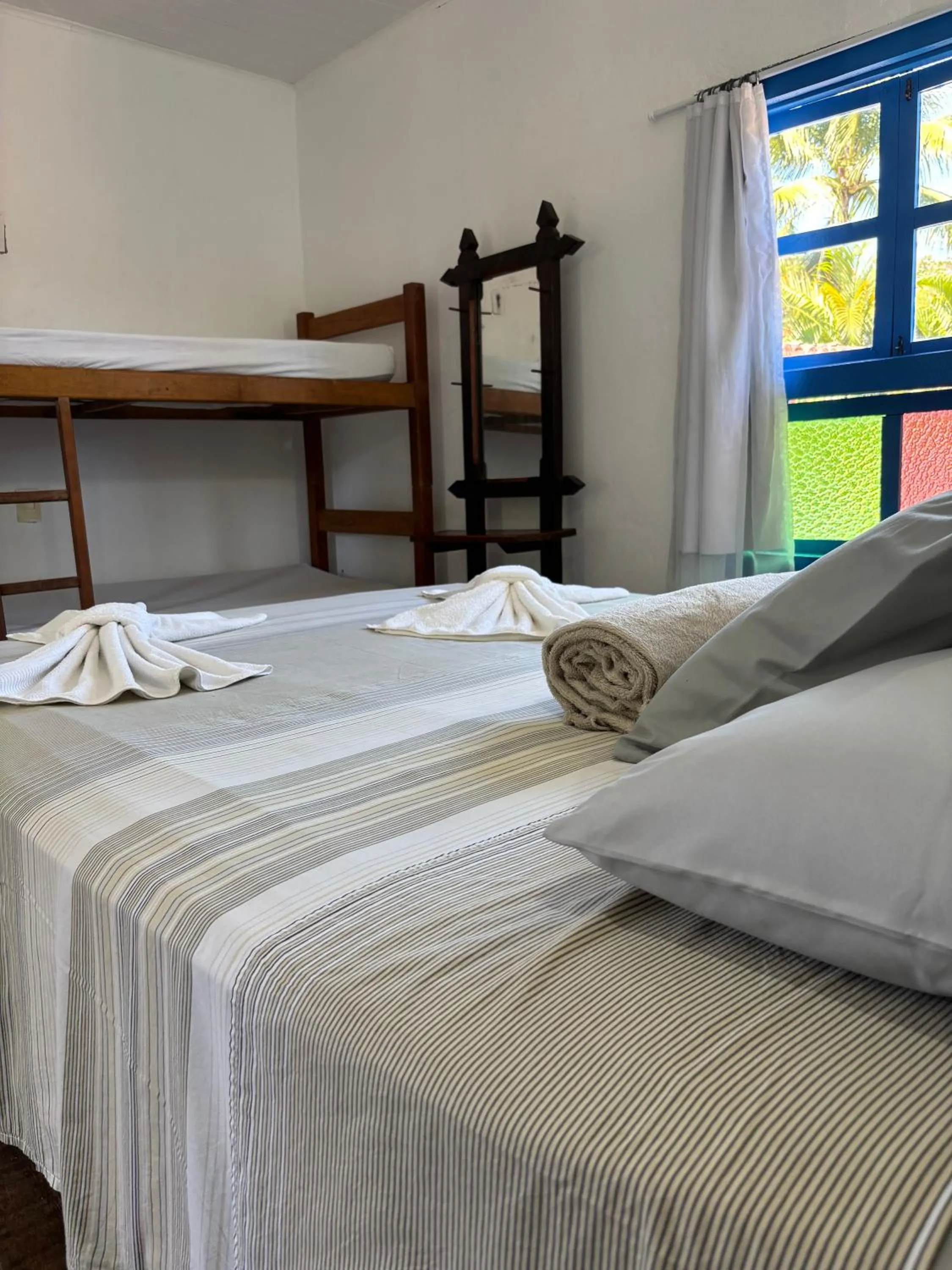 Bed in Pousada Lá na Magia