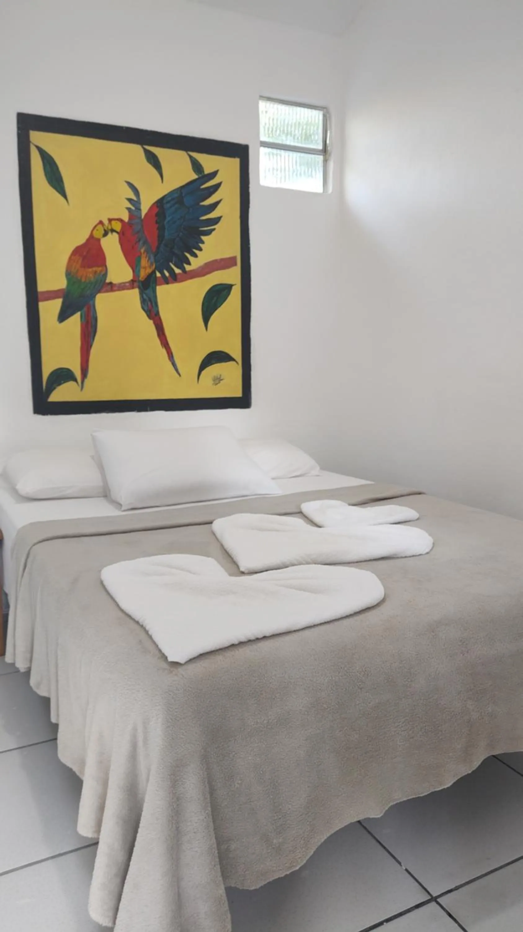 Bed in Pousada Lá na Magia