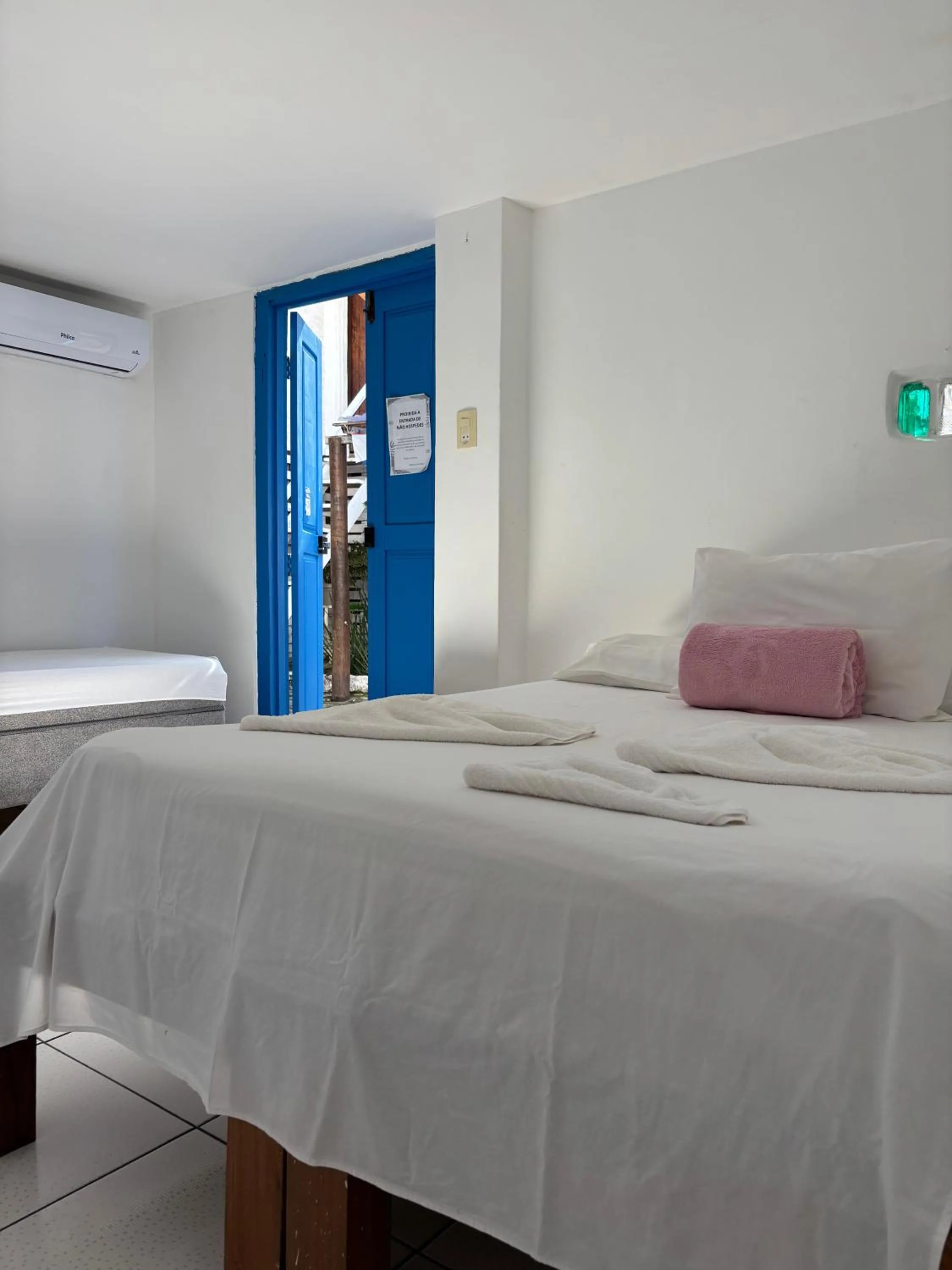 Bed in Pousada Lá na Magia