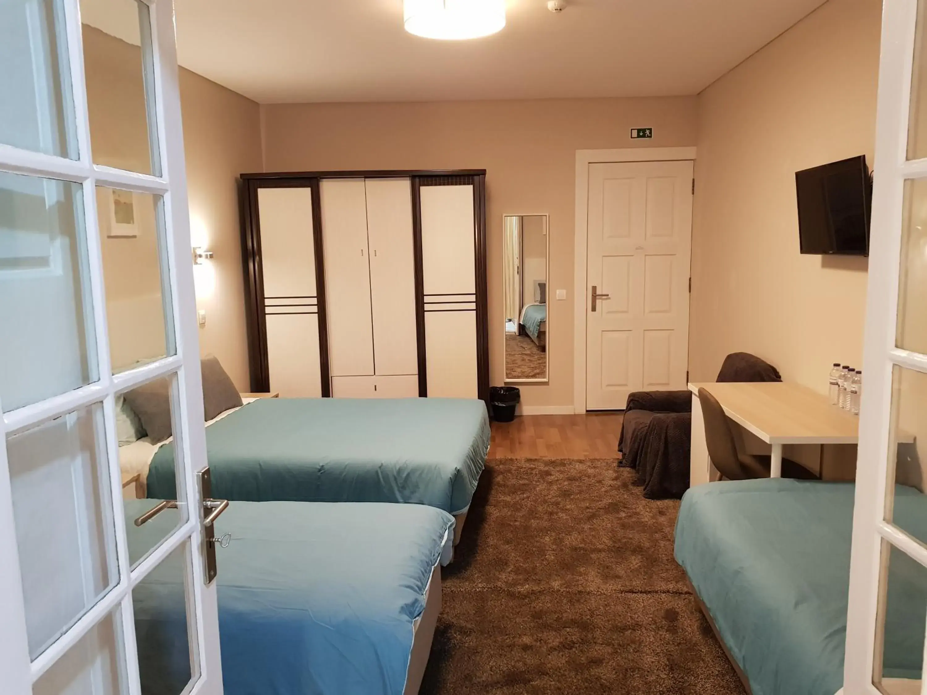 Comfort Quadruple Room in HaoBo Porto Center Comfort Quadruple Room in HaoBo Porto Center