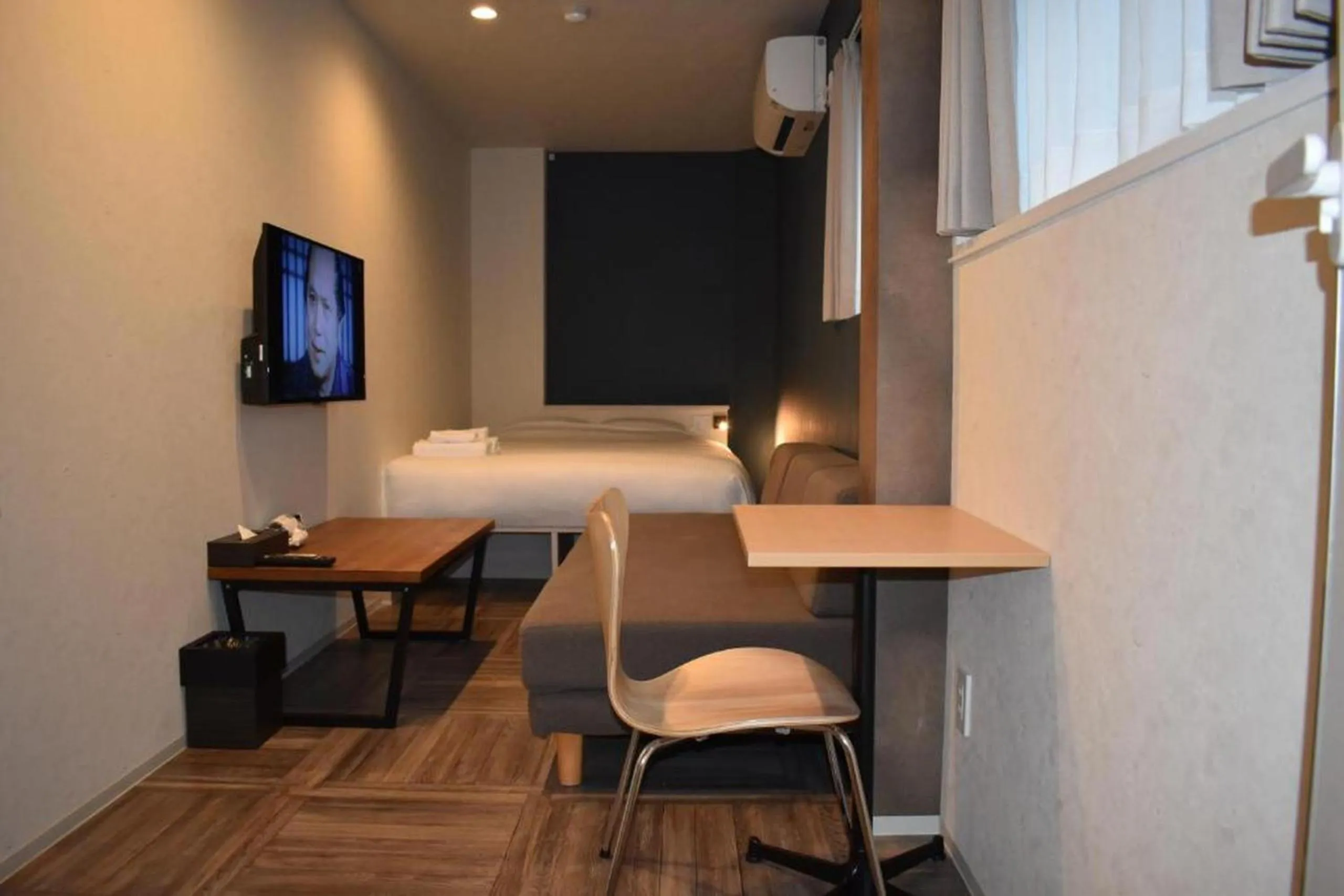 Photo of the whole room, Bed in Shinsaibashi House