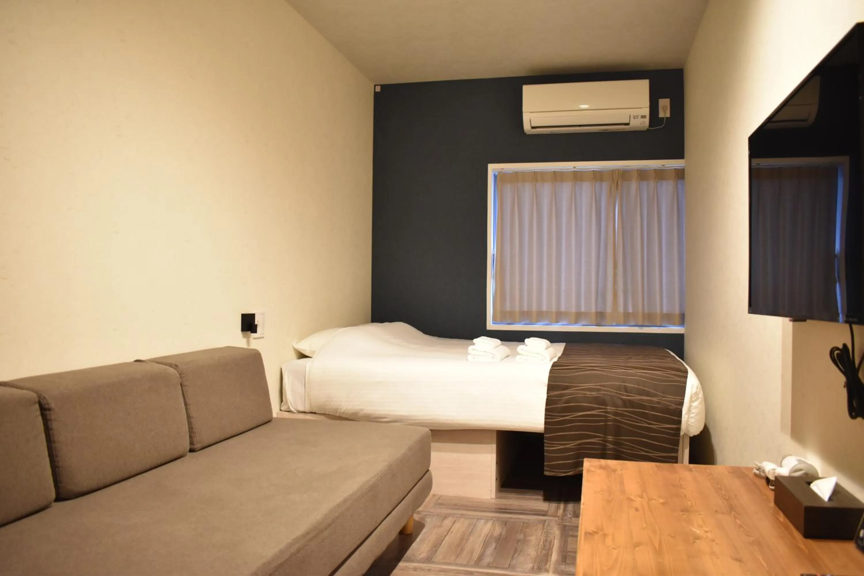 Photo of the whole room, Bed in Shinsaibashi House