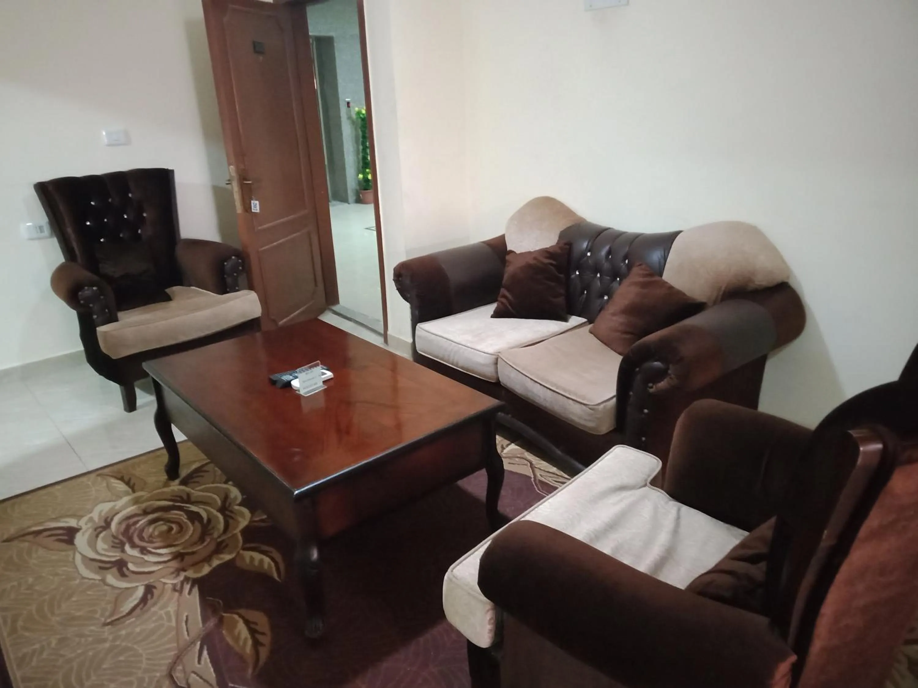 Seating area, Bed in Petra Visitors Hotel