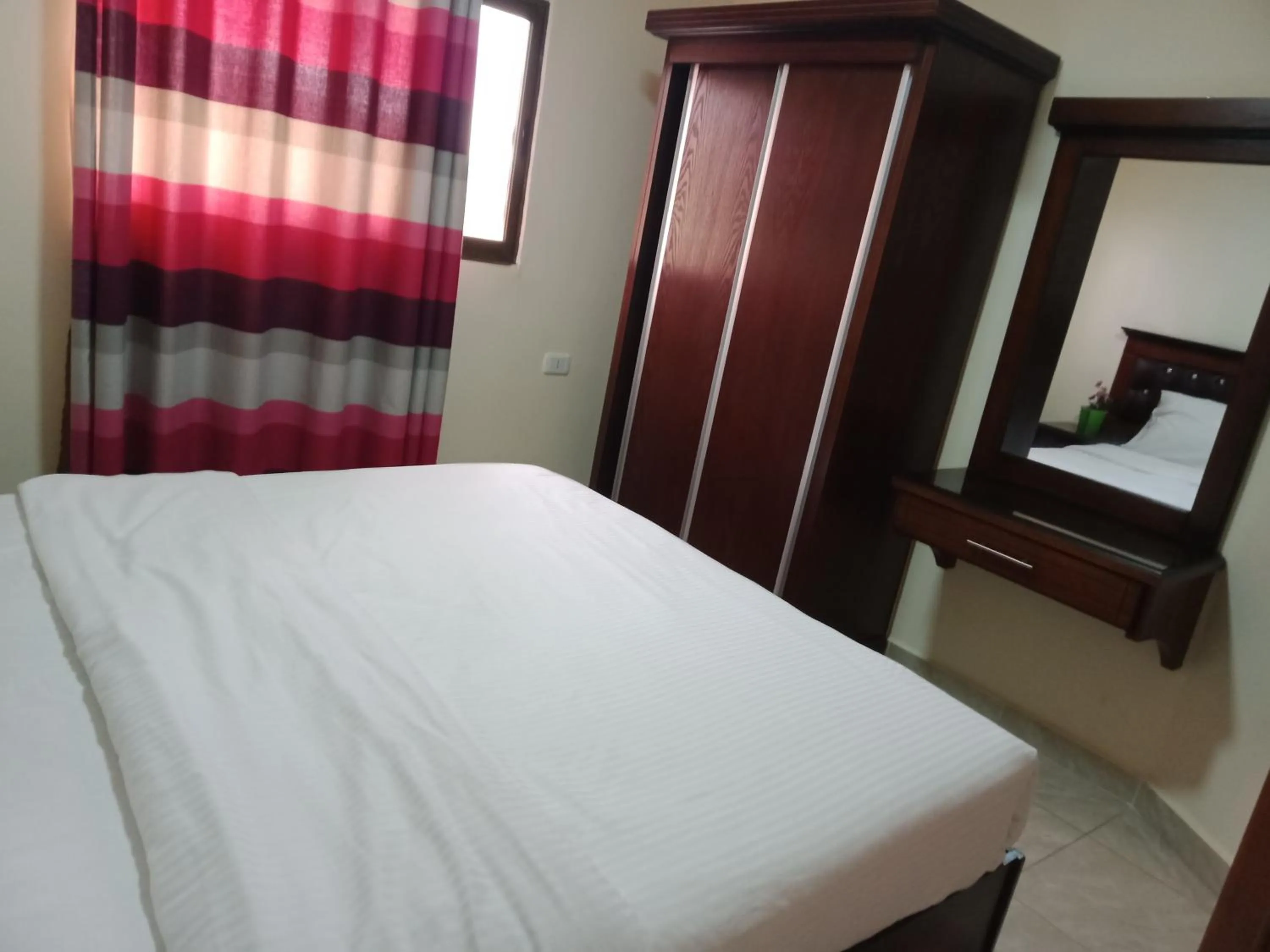 Photo of the whole room, Bed in Petra Visitors Hotel