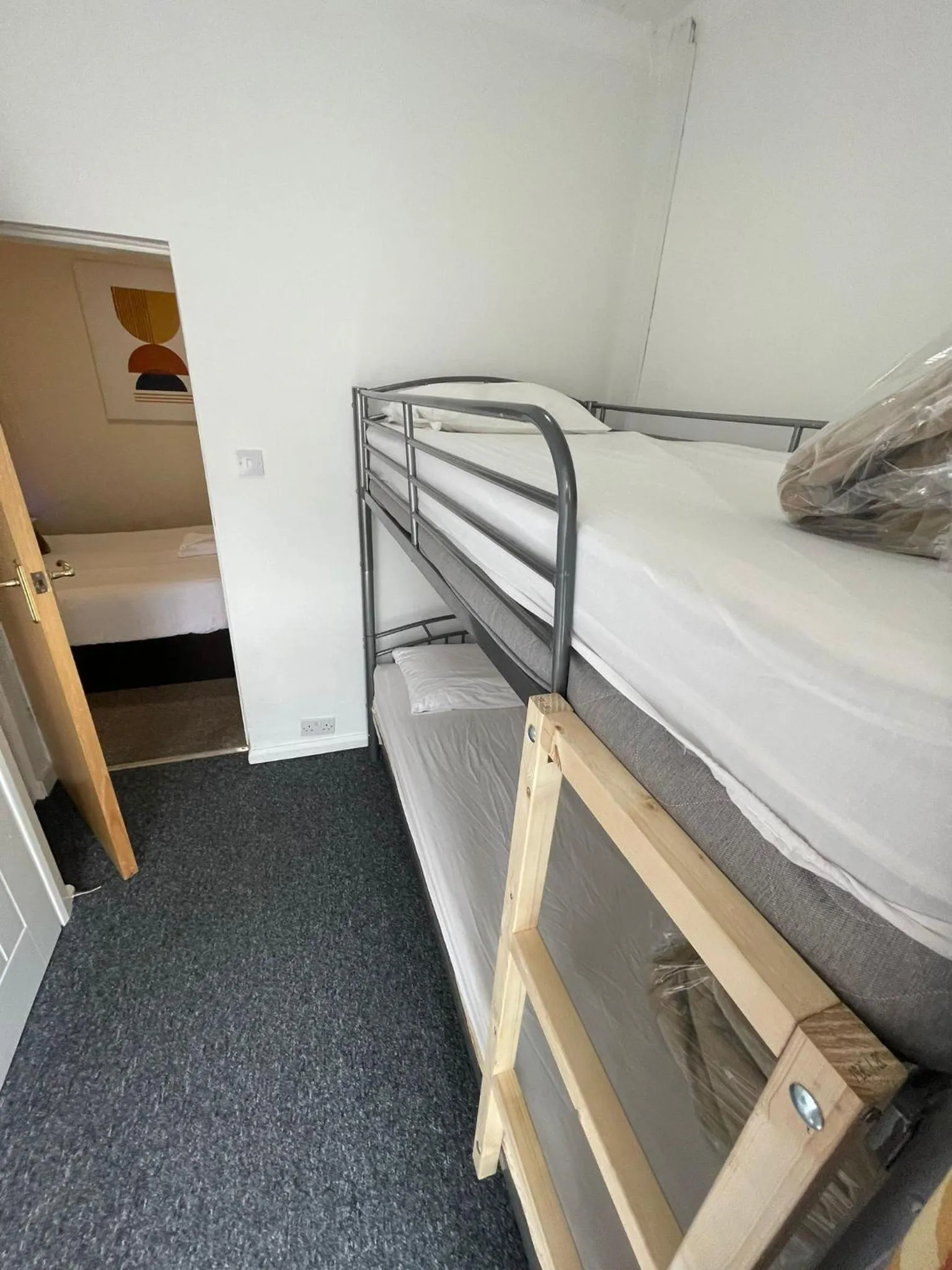 Photo of the whole room, Bed in Backpackers Blackpool Hotel & Suites