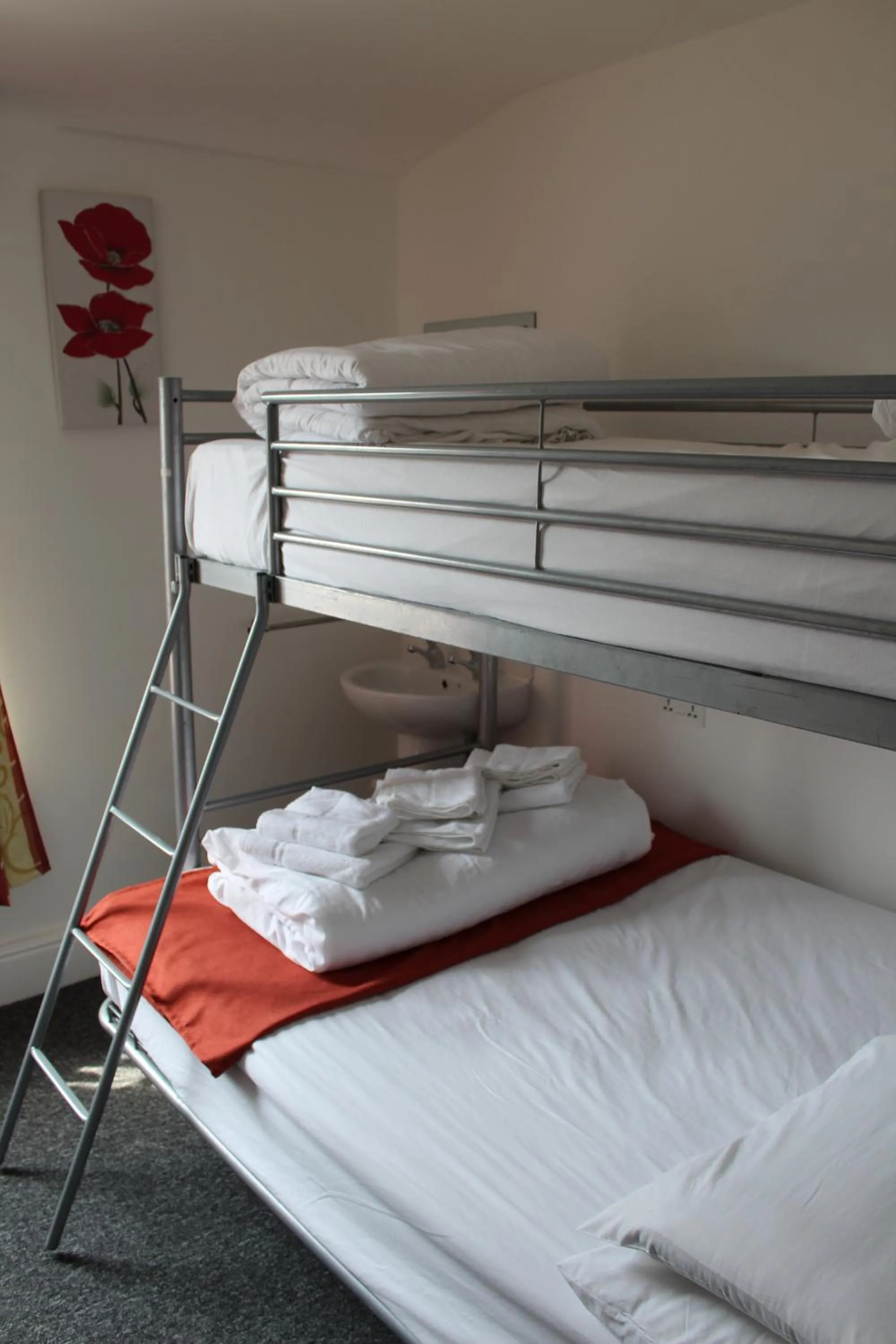 Photo of the whole room, Bed in Backpackers Blackpool Hotel & Suites